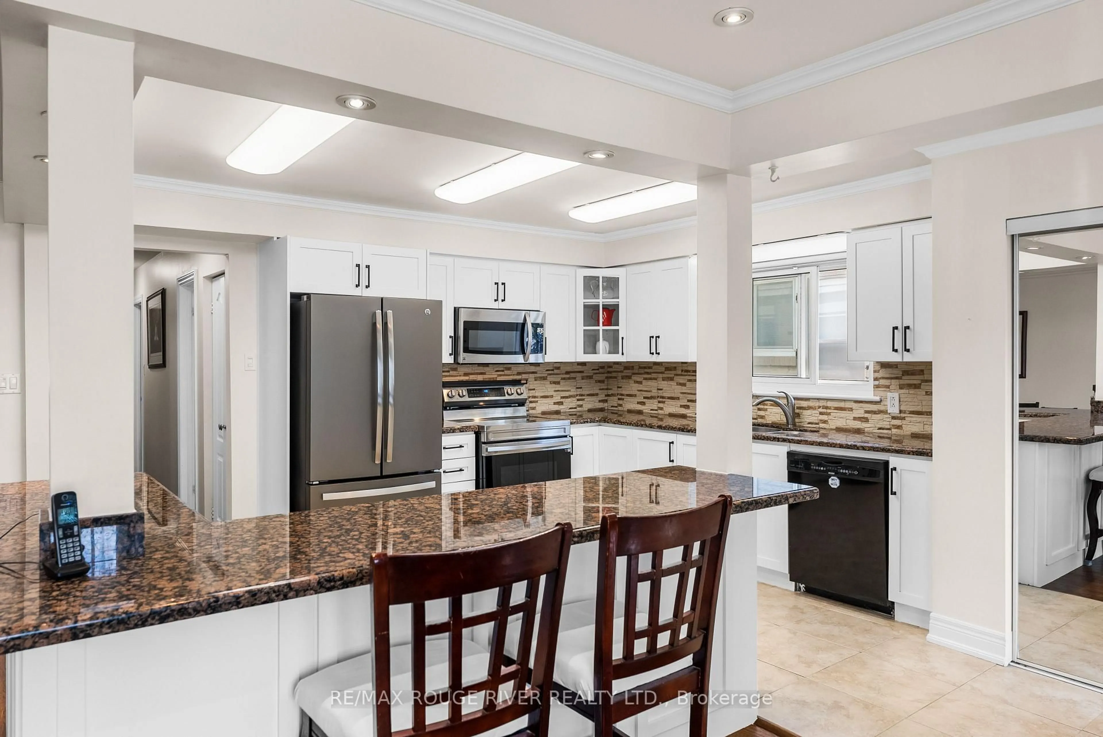 Open concept kitchen, ceramic/tile floor for 22 Tweedrock Cres, Toronto Ontario M1E 4L5