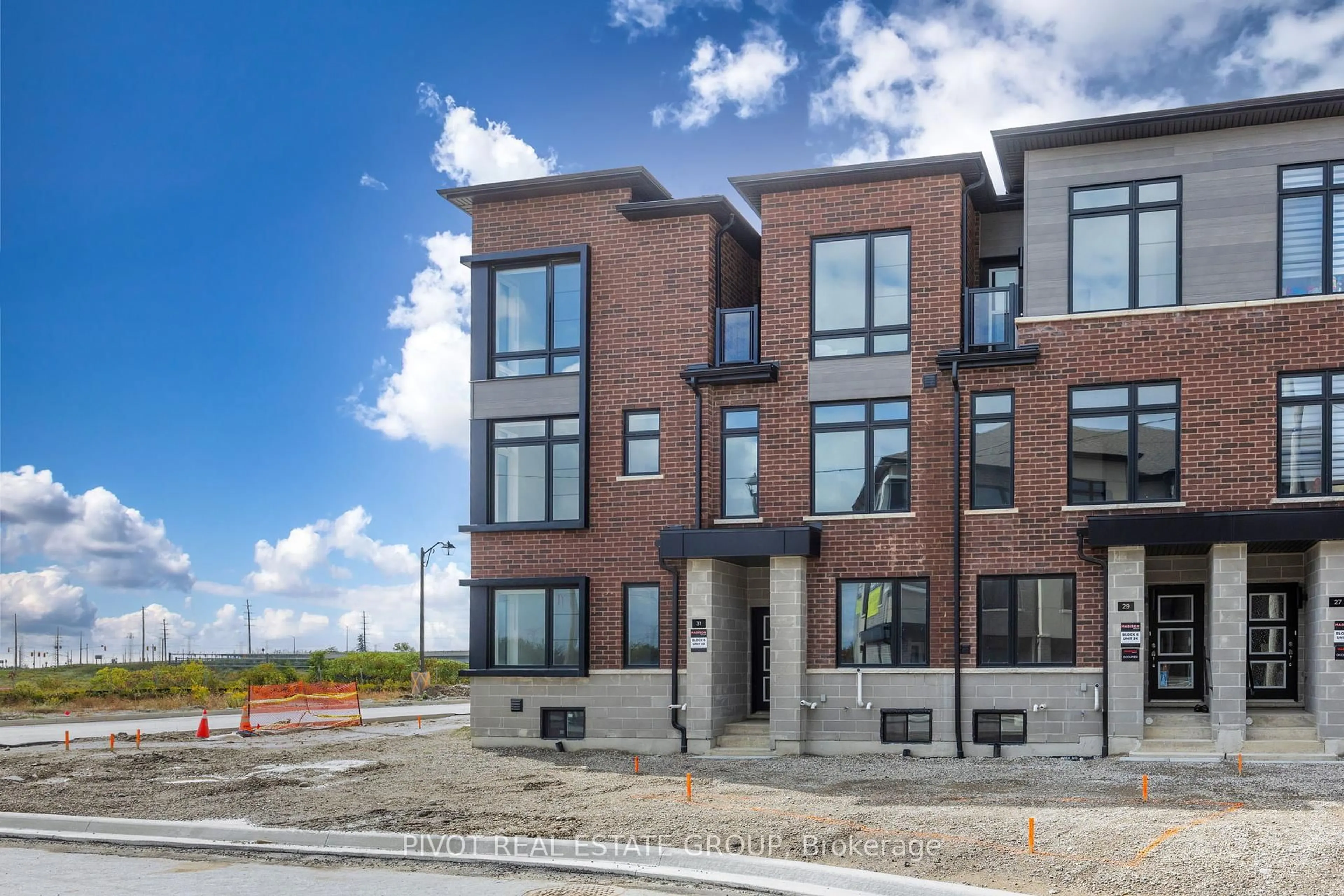 Home with brick exterior material, street for 31 Pluto Way, Whitby Ontario L1M 0M7
