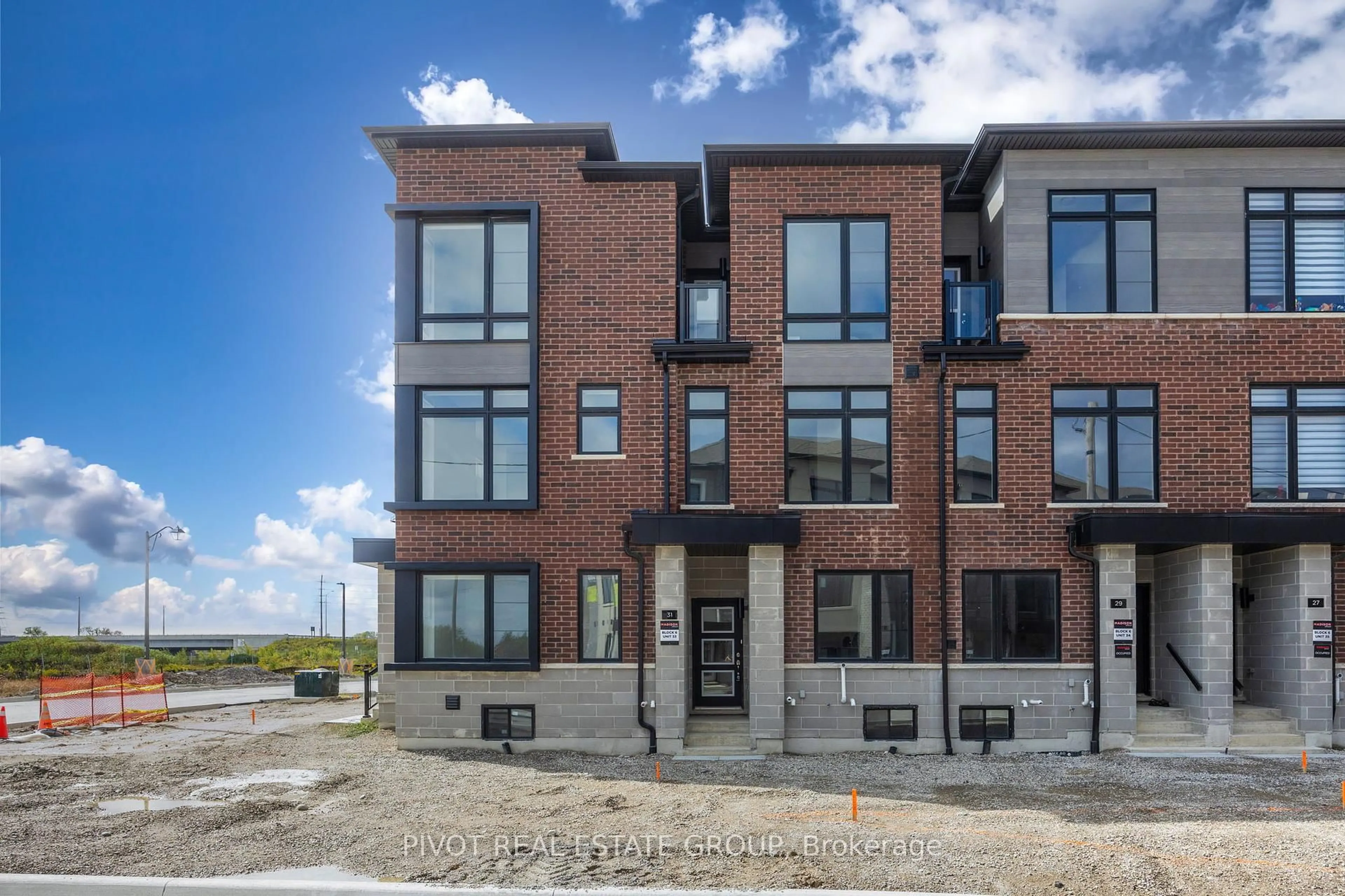 Home with brick exterior material, street for 31 Pluto Way, Whitby Ontario L1M 0M7