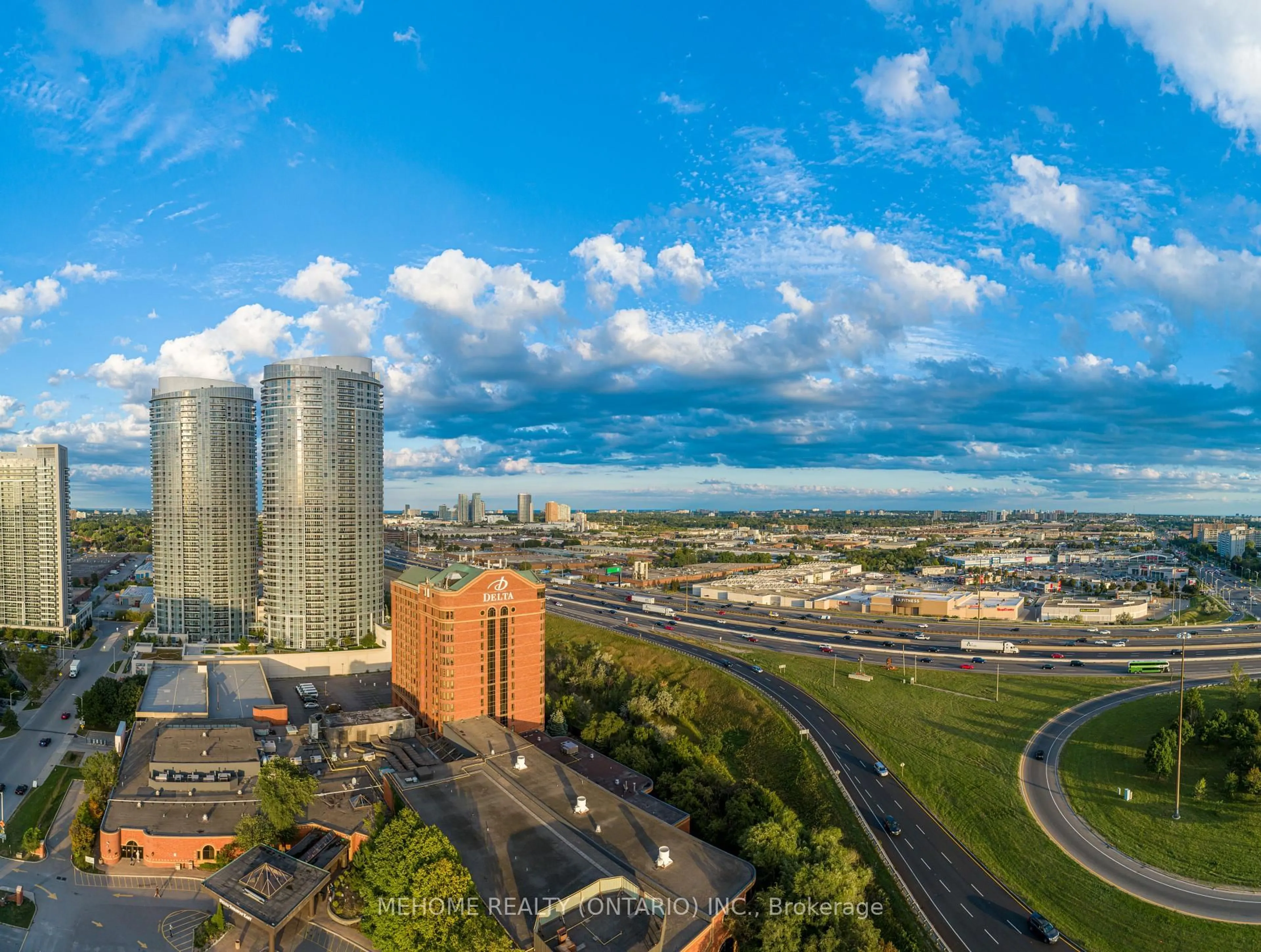 A pic from outside/outdoor area/front of a property/back of a property/a pic from drone, city buildings view from balcony for 2033 Kennedy Rd #718, Toronto Ontario M1T 0V9
