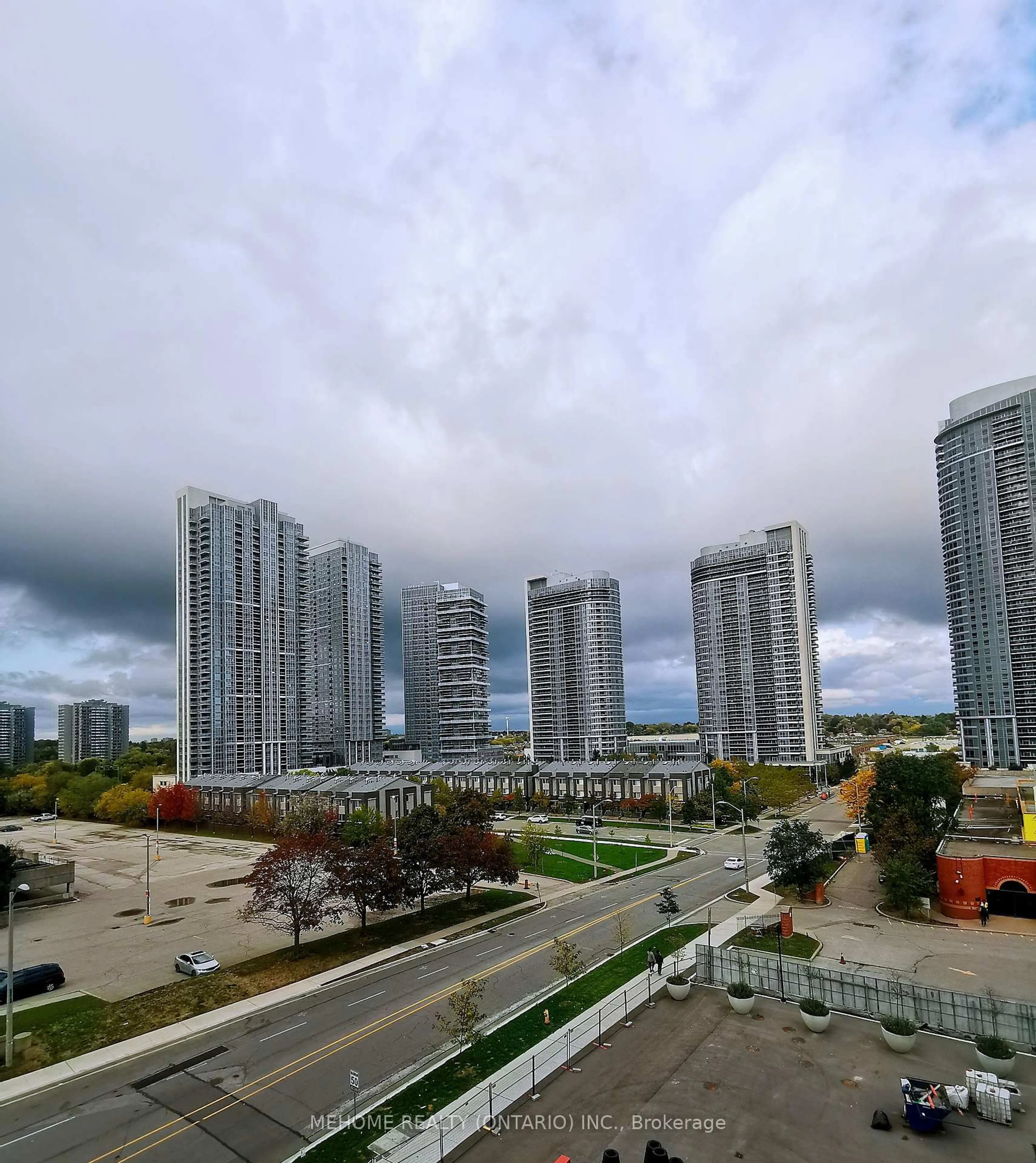 A pic from outside/outdoor area/front of a property/back of a property/a pic from drone, city buildings view from balcony for 2033 Kennedy Rd #718, Toronto Ontario M1T 0V9