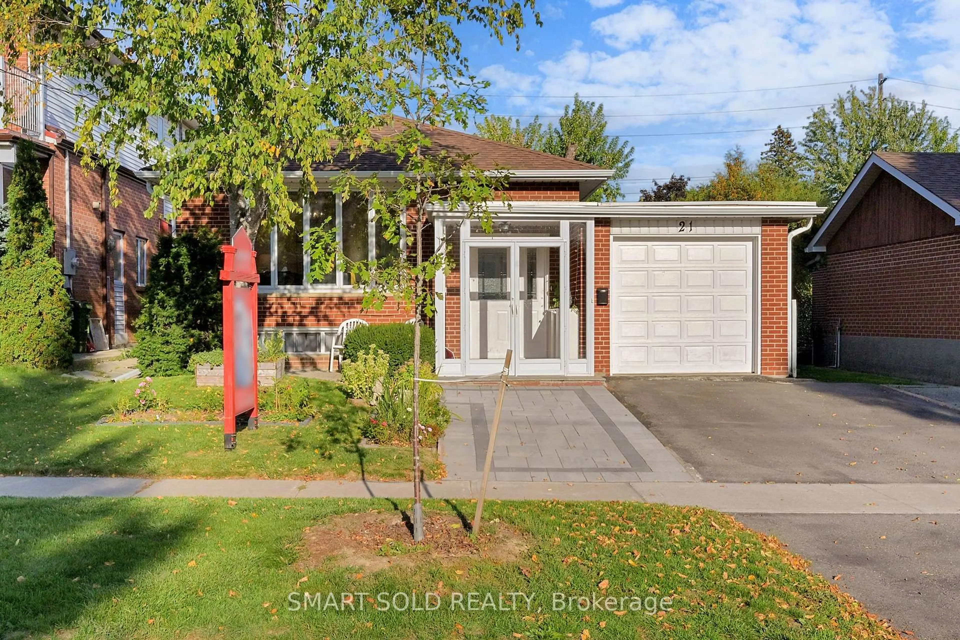Home with brick exterior material, street for 21 Sunmount Rd, Toronto Ontario M1T 2A4