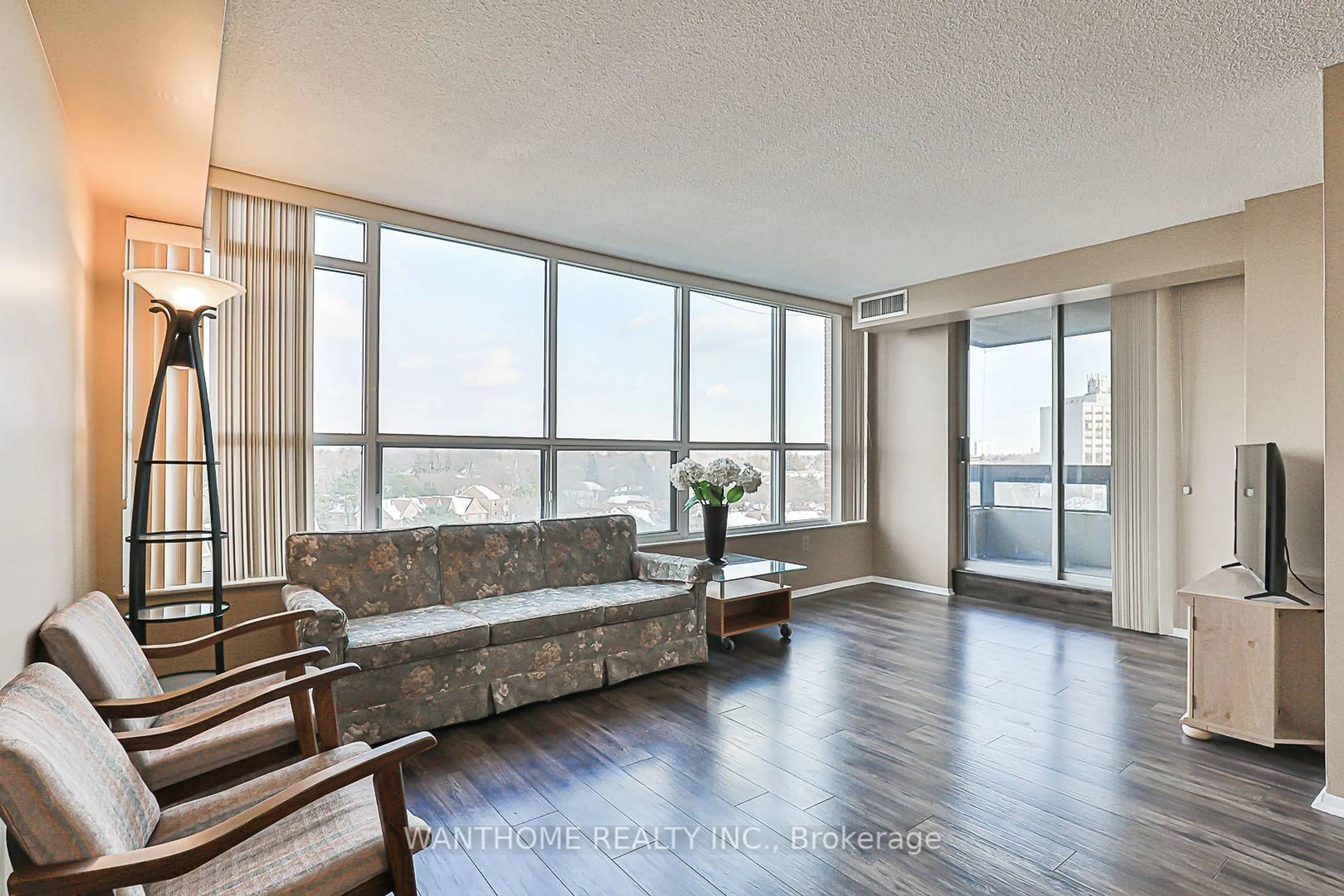 Living room with furniture, wood/laminate floor for 2365 Kennedy Rd #801, Toronto Ontario M1T 3S6