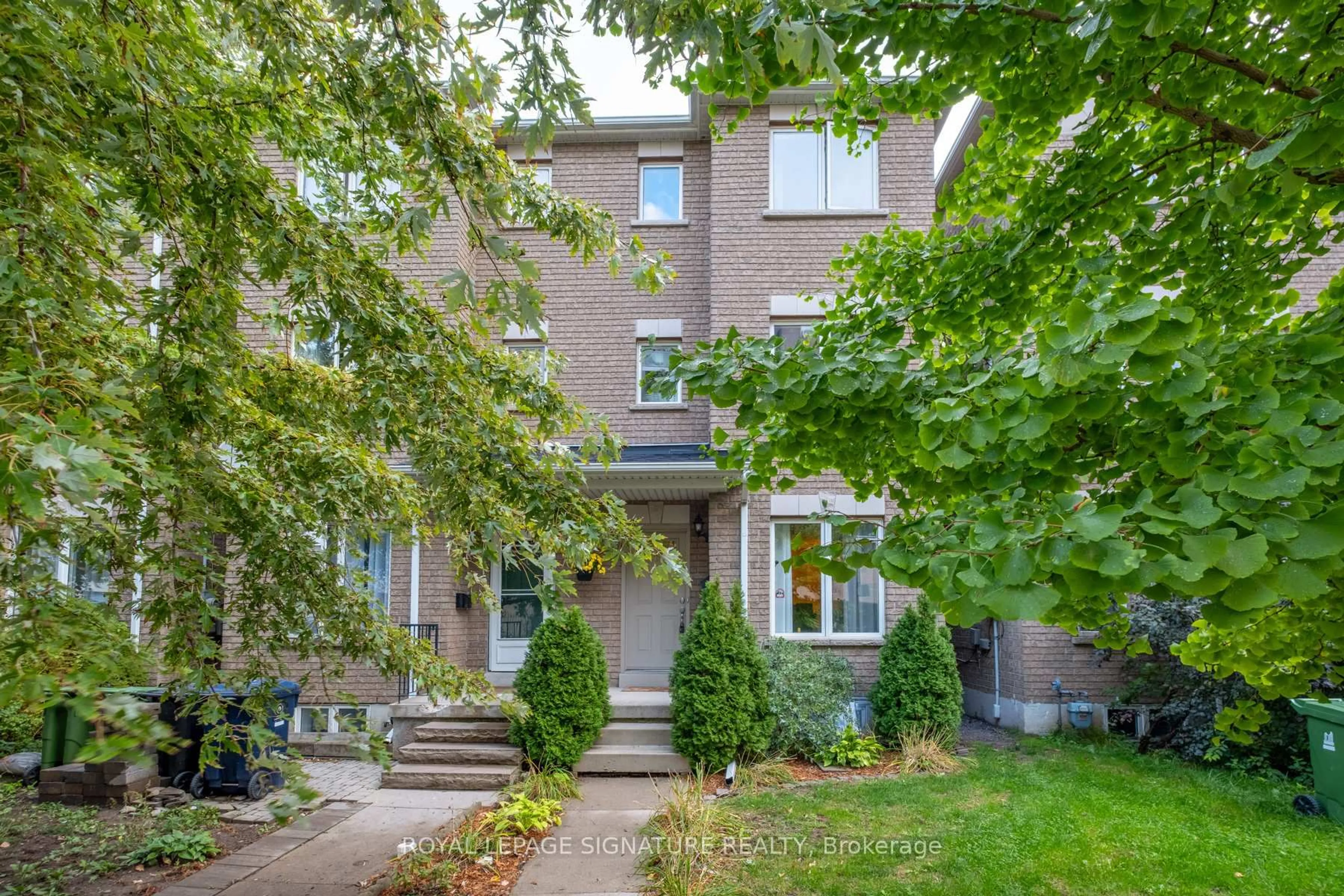Home with brick exterior material, street for 21 Trent Ave, Toronto Ontario M4C 5C6
