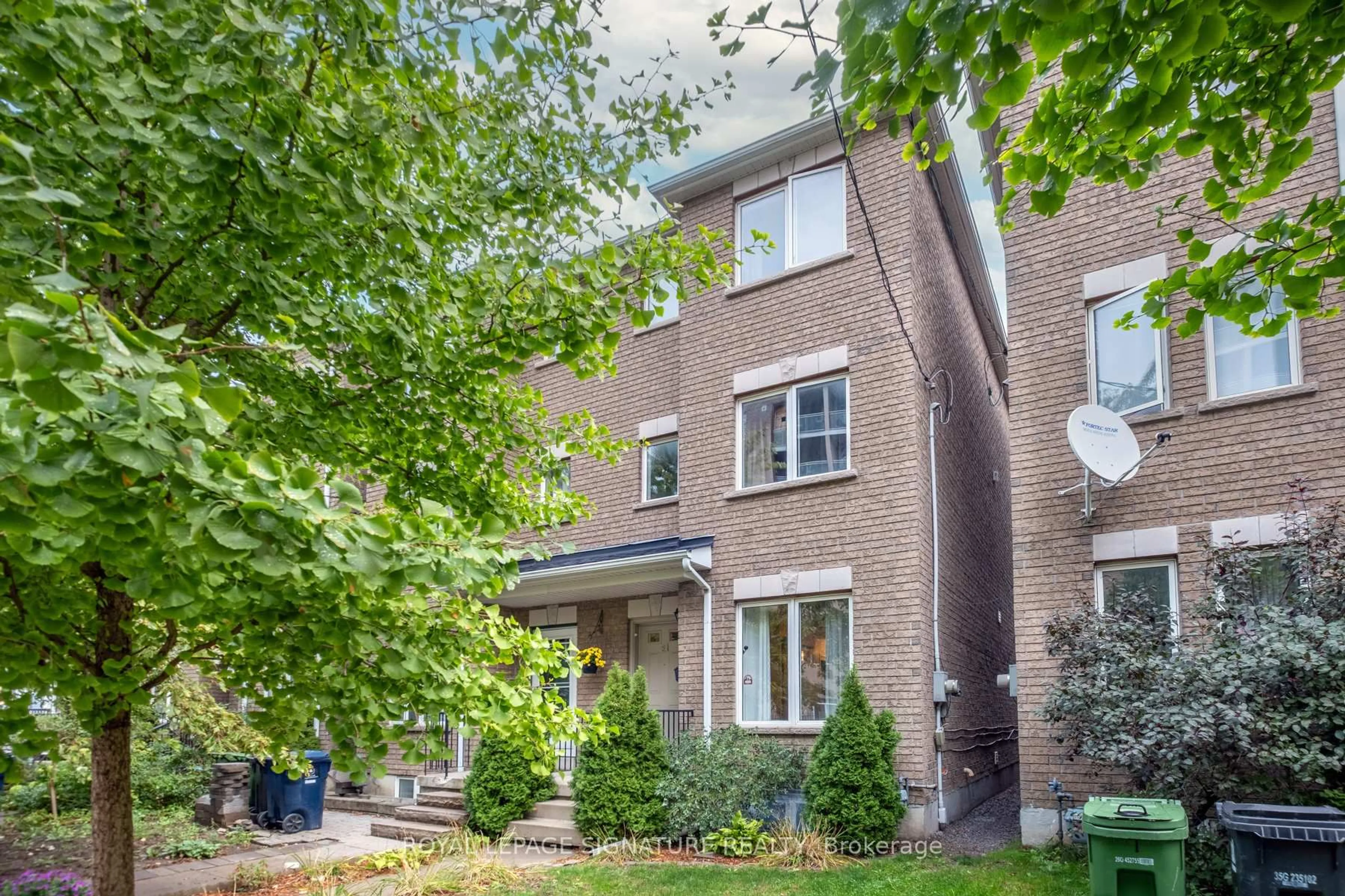 Home with brick exterior material, street for 21 Trent Ave, Toronto Ontario M4C 5C6