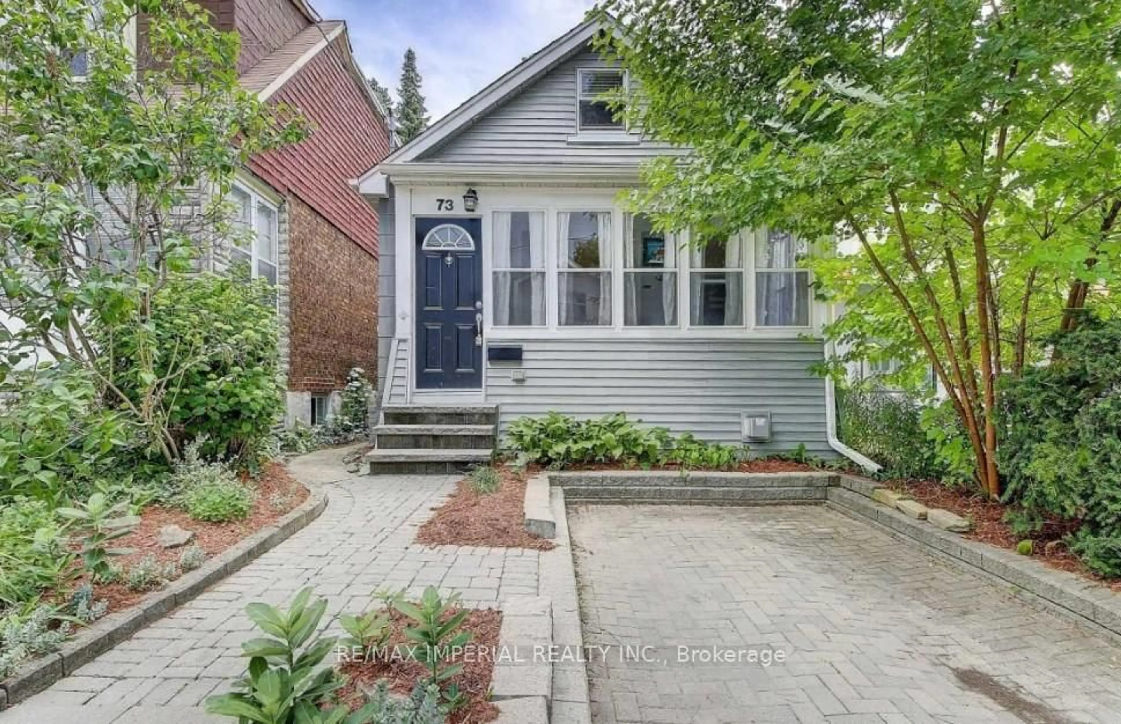 Home with brick exterior material, street for 73 Barker Ave, Toronto Ontario M4C 2N7