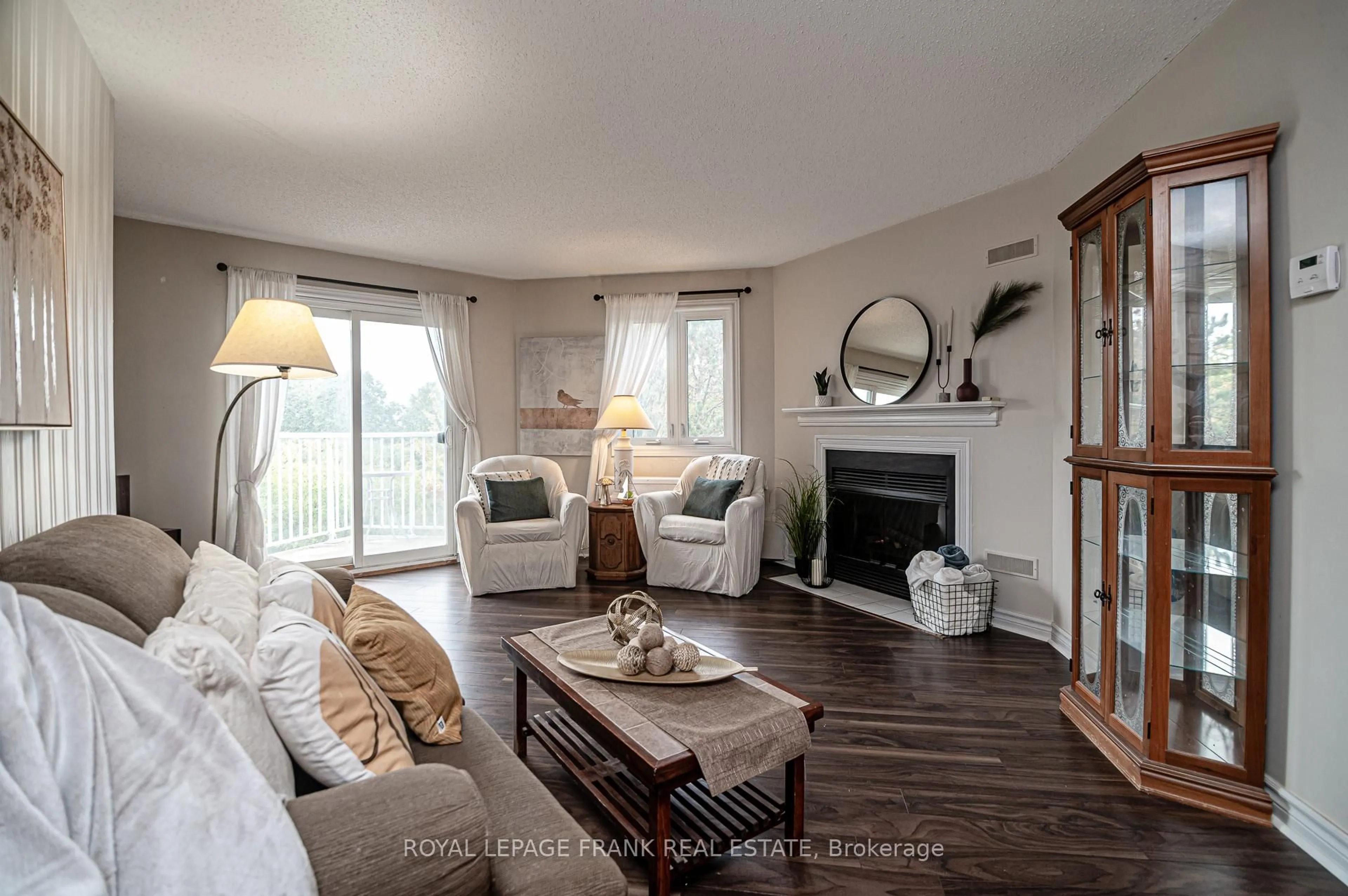 Living room with furniture, wood/laminate floor for 191 Lake Driveway Way #314, Ajax Ontario L1S 7H9