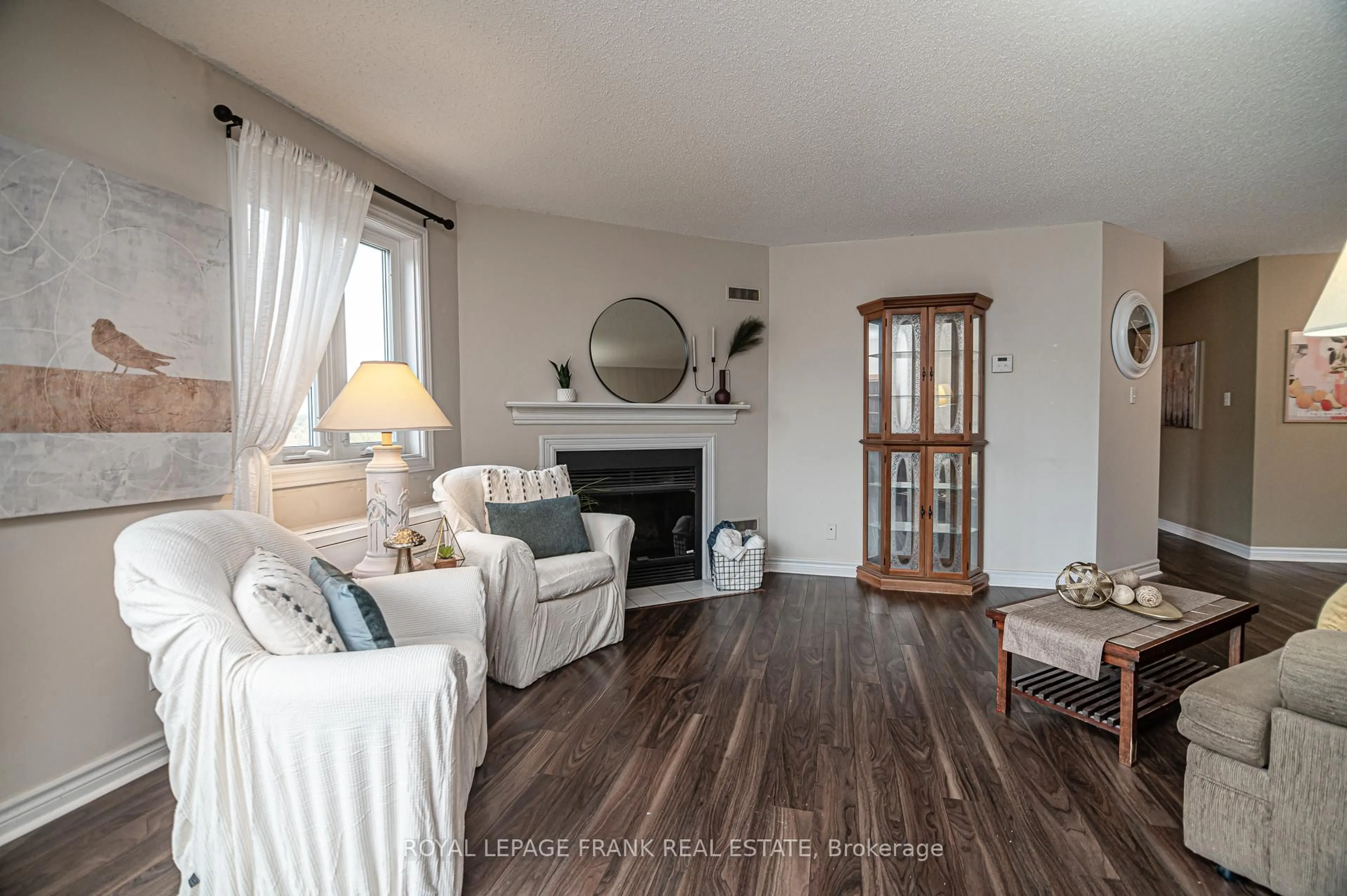 Living room with furniture, wood/laminate floor for 191 Lake Driveway Way #314, Ajax Ontario L1S 7H9