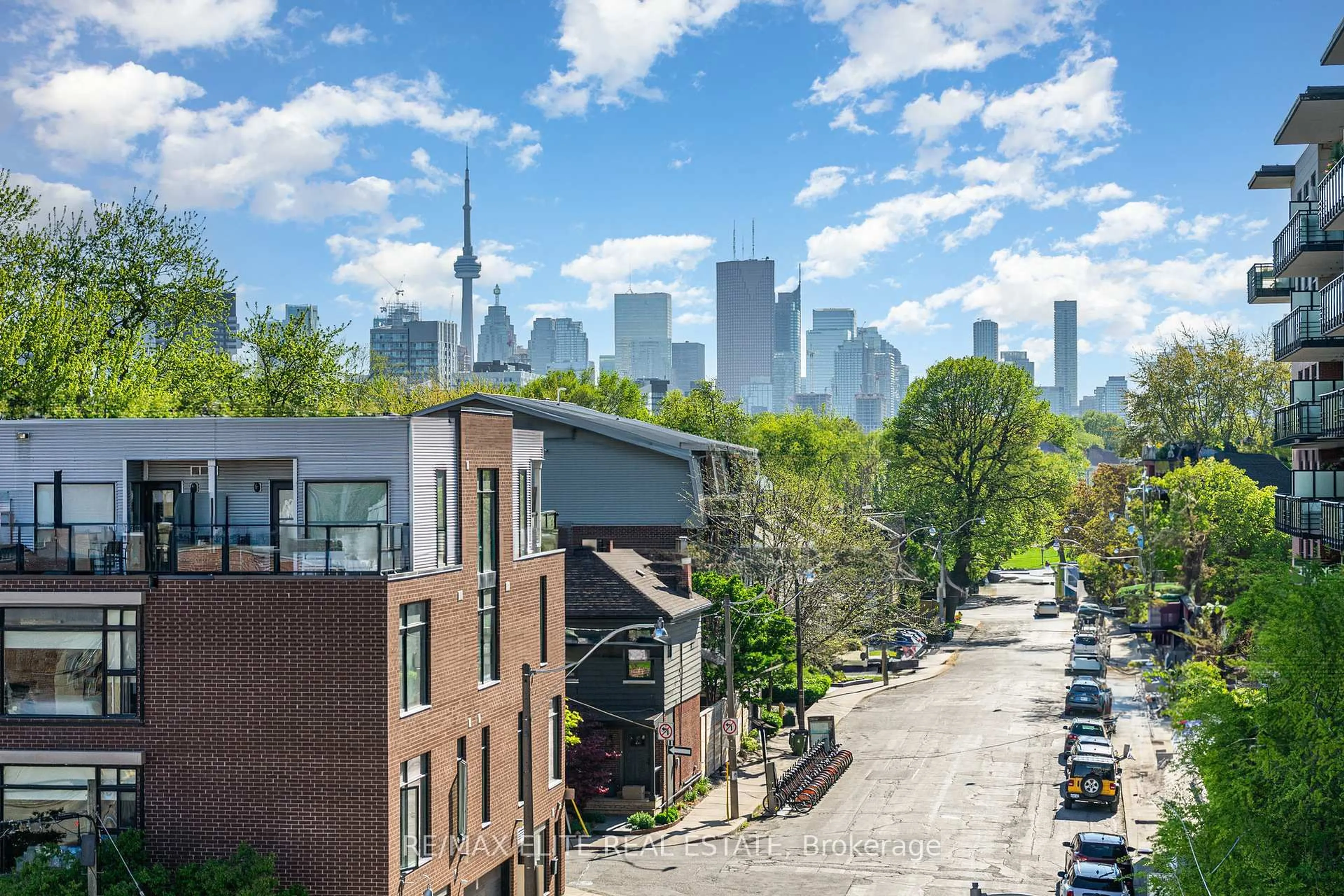 Patio, city buildings view from balcony for 201 Carlaw Ave #412, Toronto Ontario M4M 2S3