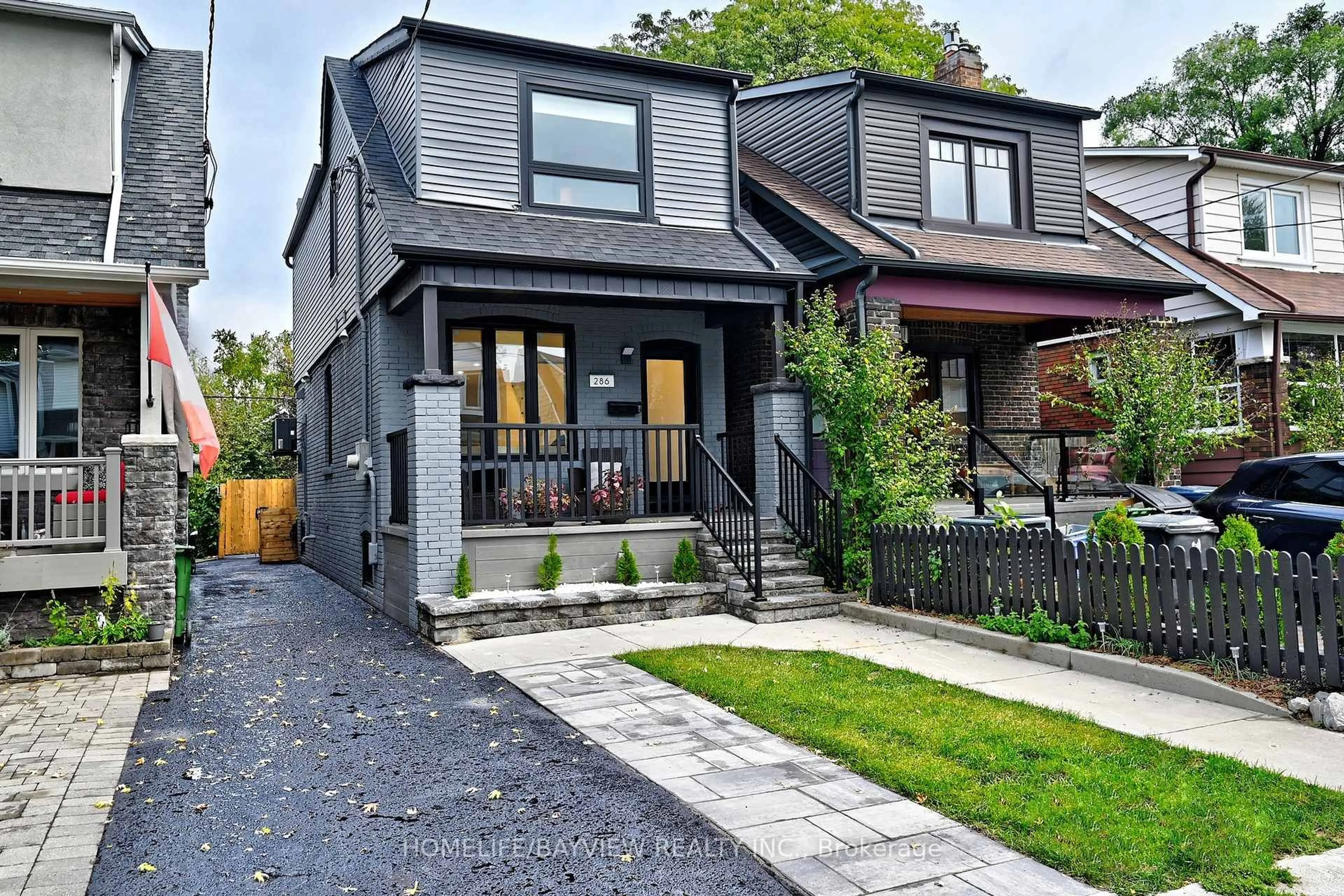 Home with brick exterior material, street for 286 Springdale Blvd, Toronto Ontario M4C 2A2