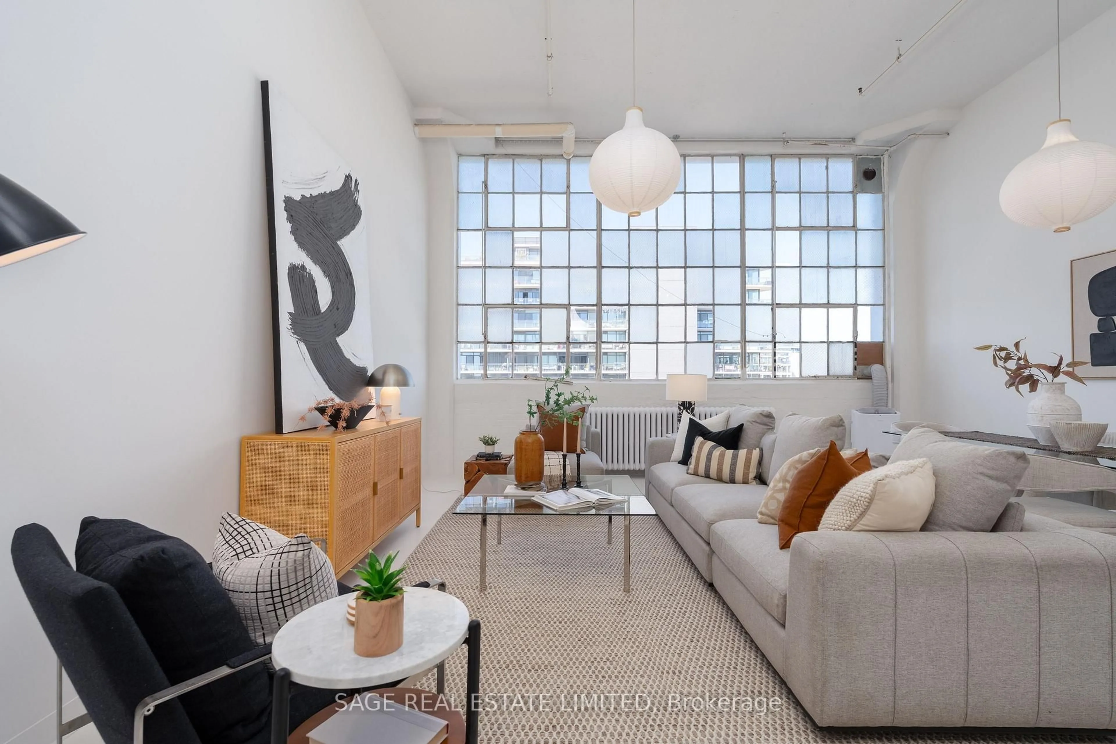 Living room with furniture, unknown for 245 Carlaw Ave #403, Toronto Ontario M4M 2S1