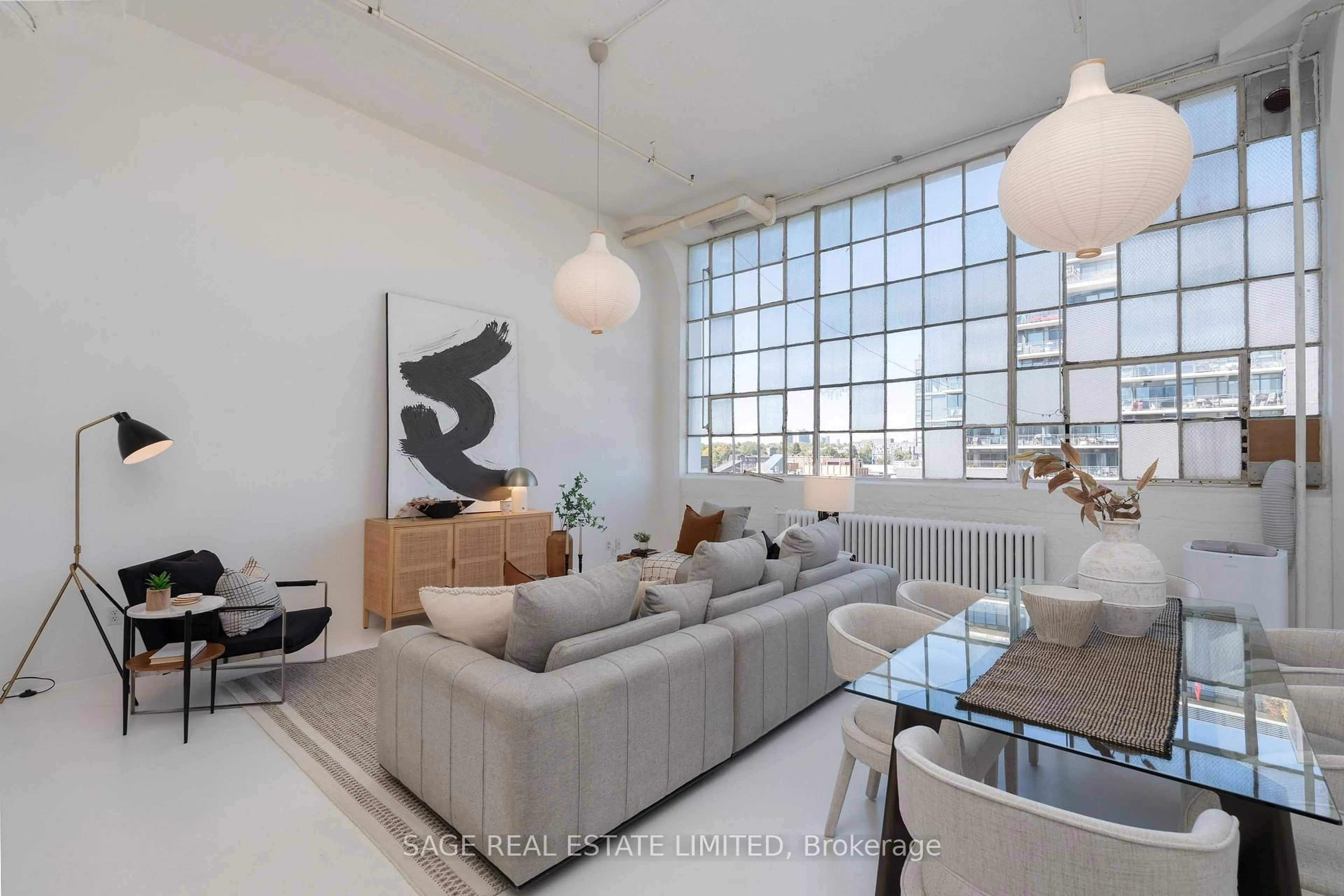 Living room with furniture, unknown for 245 Carlaw Ave #403, Toronto Ontario M4M 2S1