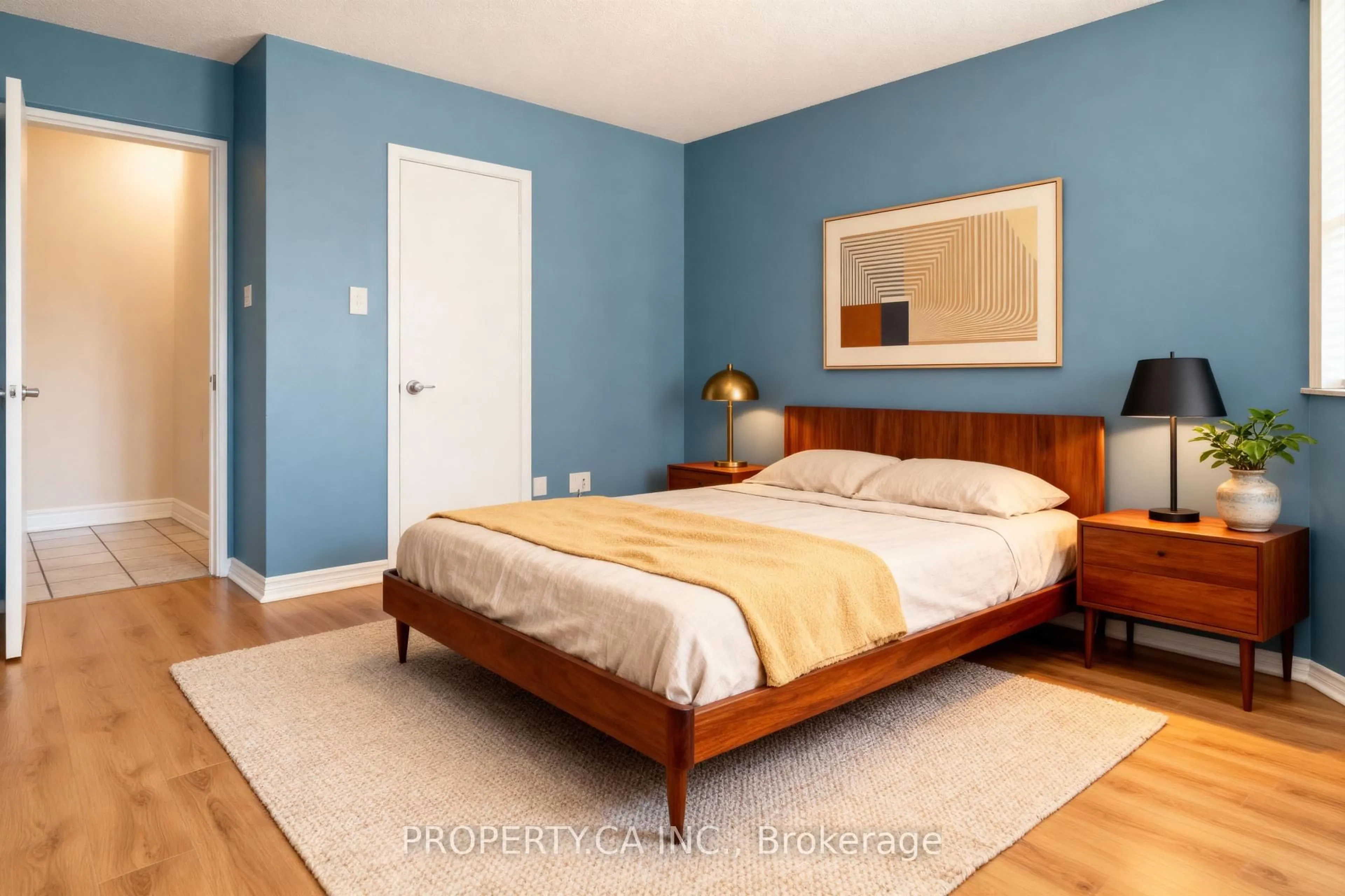 Bedroom with bed, wood/laminate floor for 55 Huntingdale Blvd #208, Toronto Ontario M1W 2N9