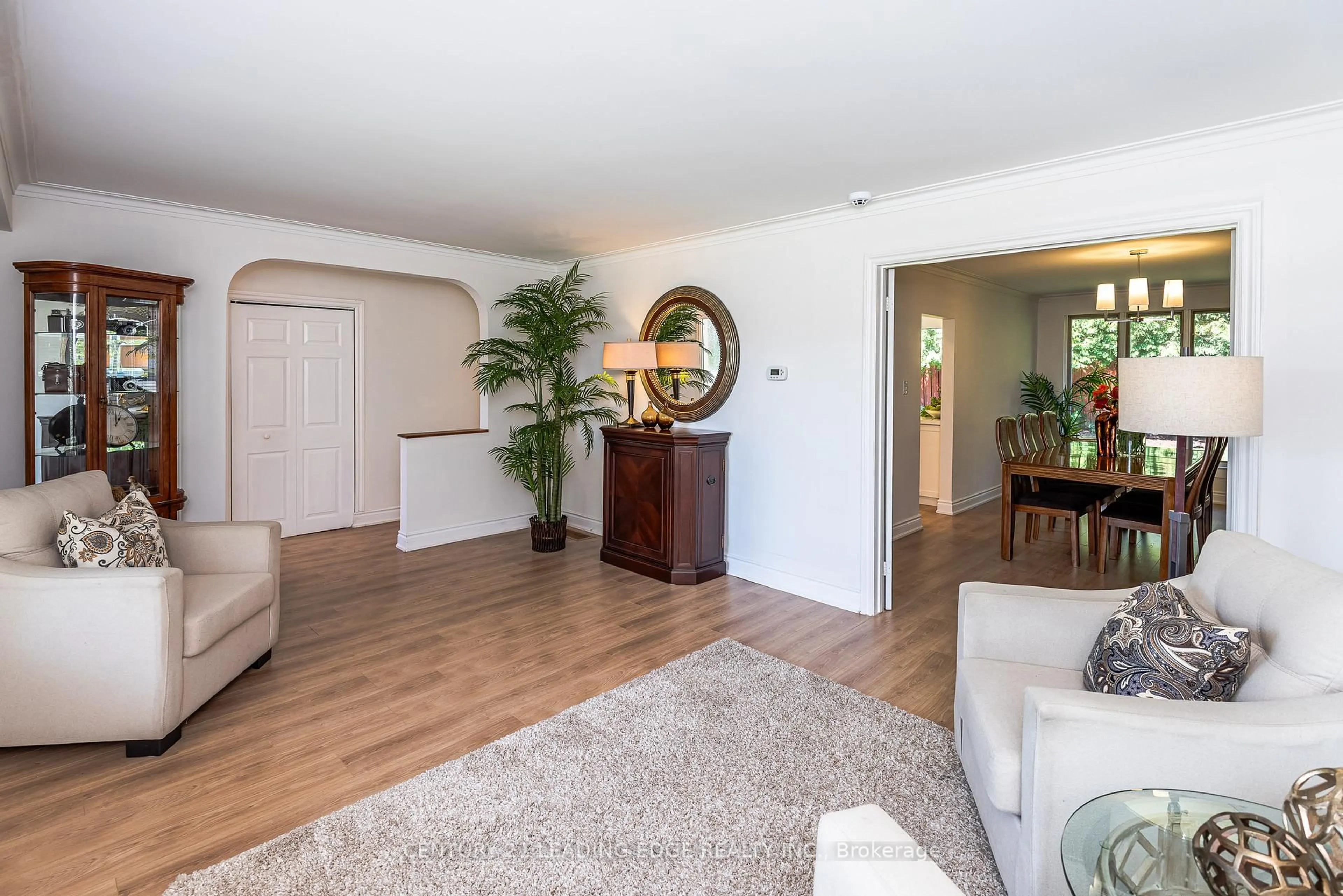 Living room with furniture, wood/laminate floor for 14 Amberjack Blvd, Toronto Ontario M1H 2J3