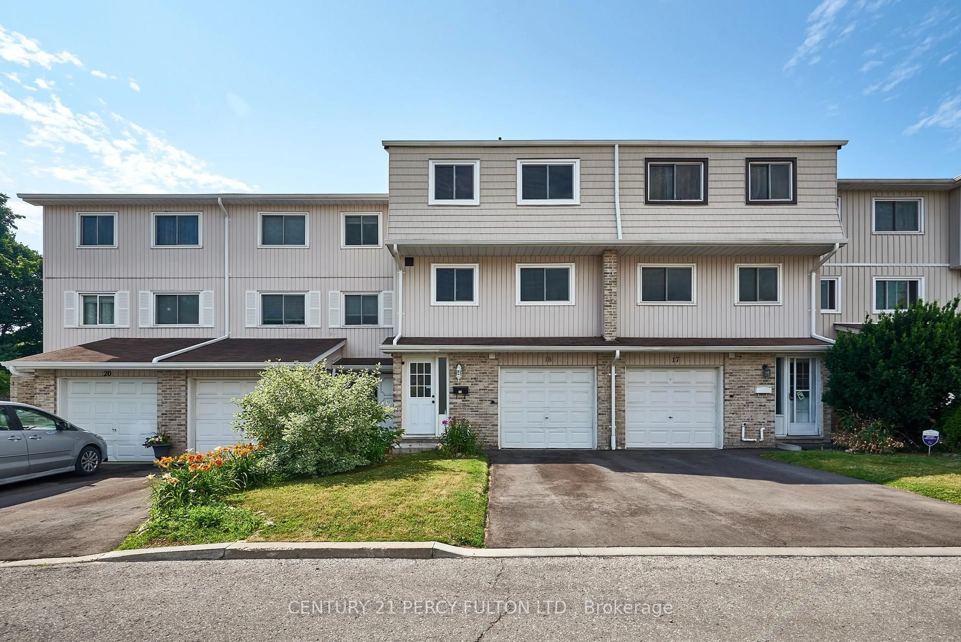 A pic from outside/outdoor area/front of a property/back of a property/a pic from drone, street for 1975 Rosefield Rd #18, Pickering Ontario L1V 3E3