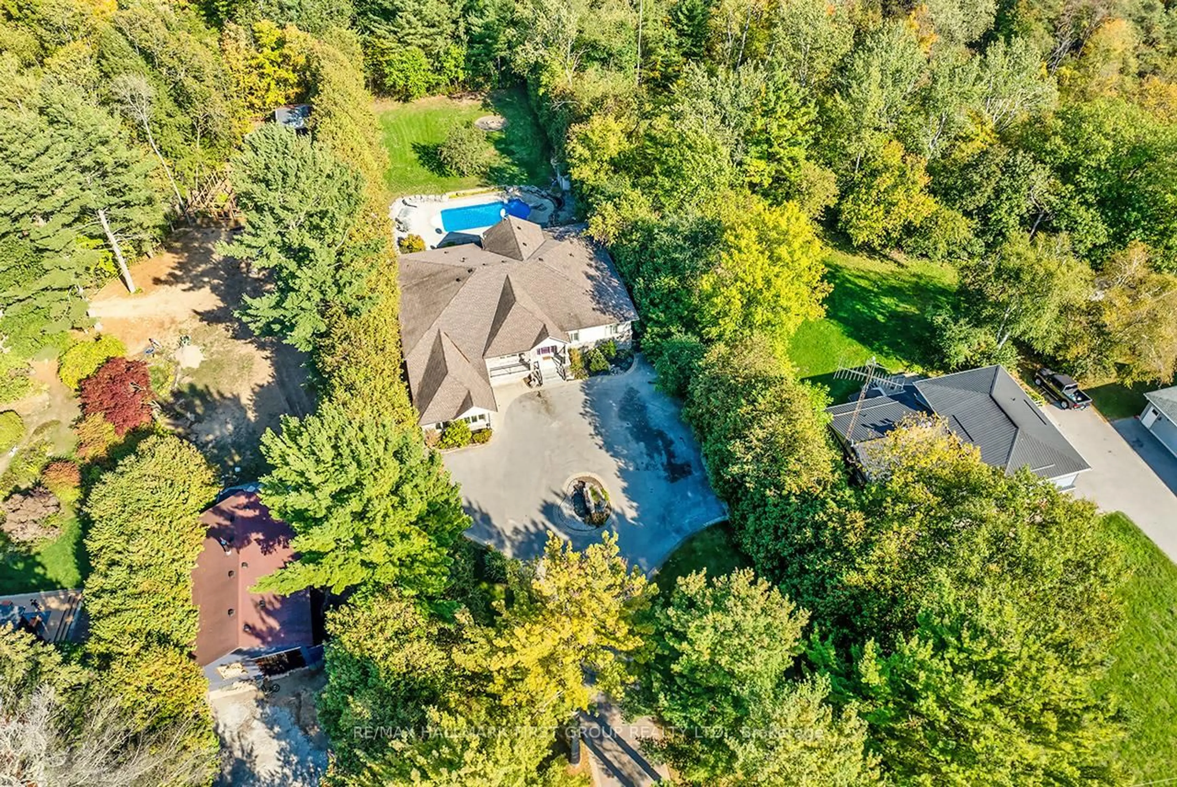 A pic from outside/outdoor area/front of a property/back of a property/a pic from drone, forest/trees view for 15 Shepherd Rd, Whitby Ontario L1M 1G8