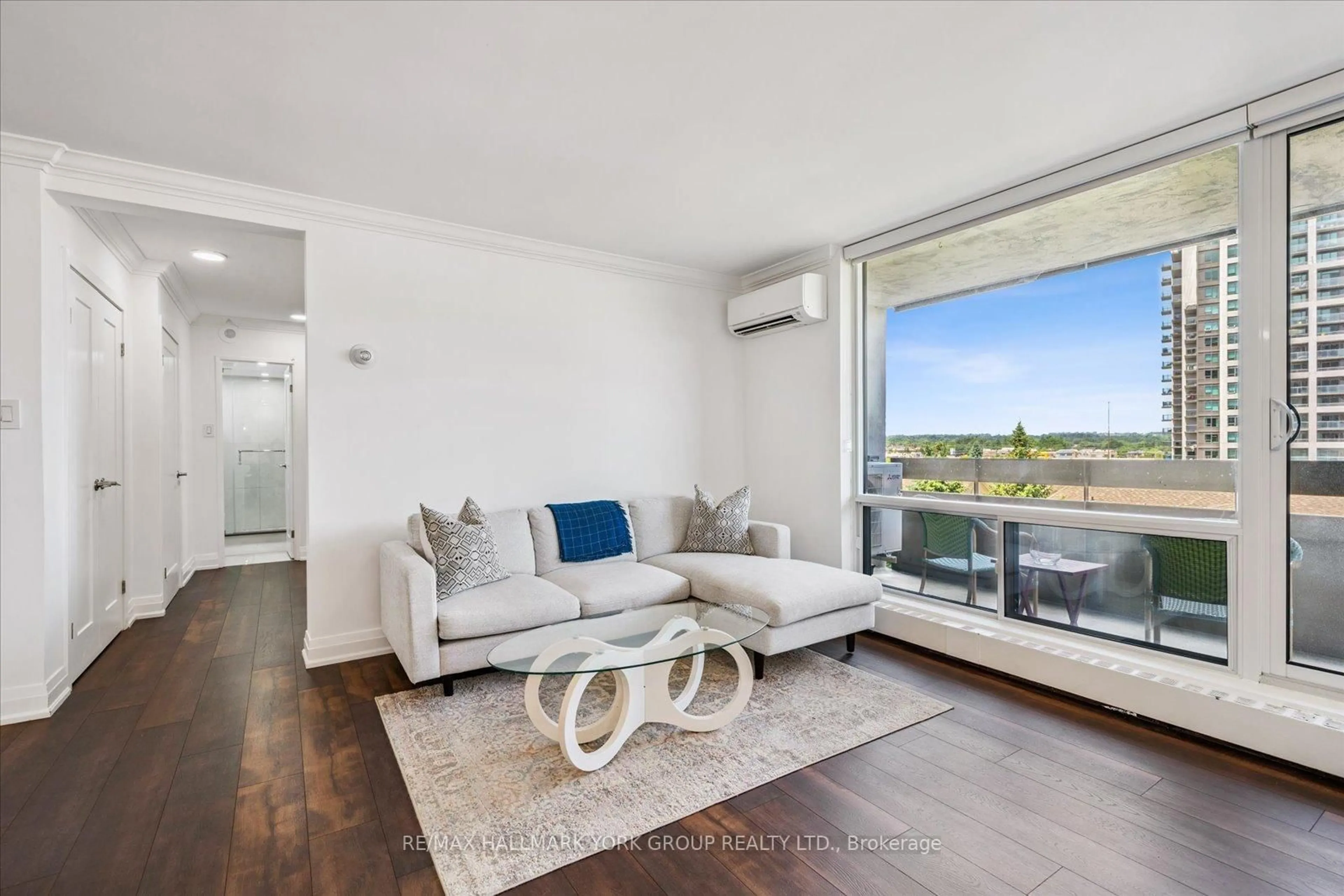 Living room with furniture, wood/laminate floor for 1210 Radom St #701, Pickering Ontario L1W 2Z3