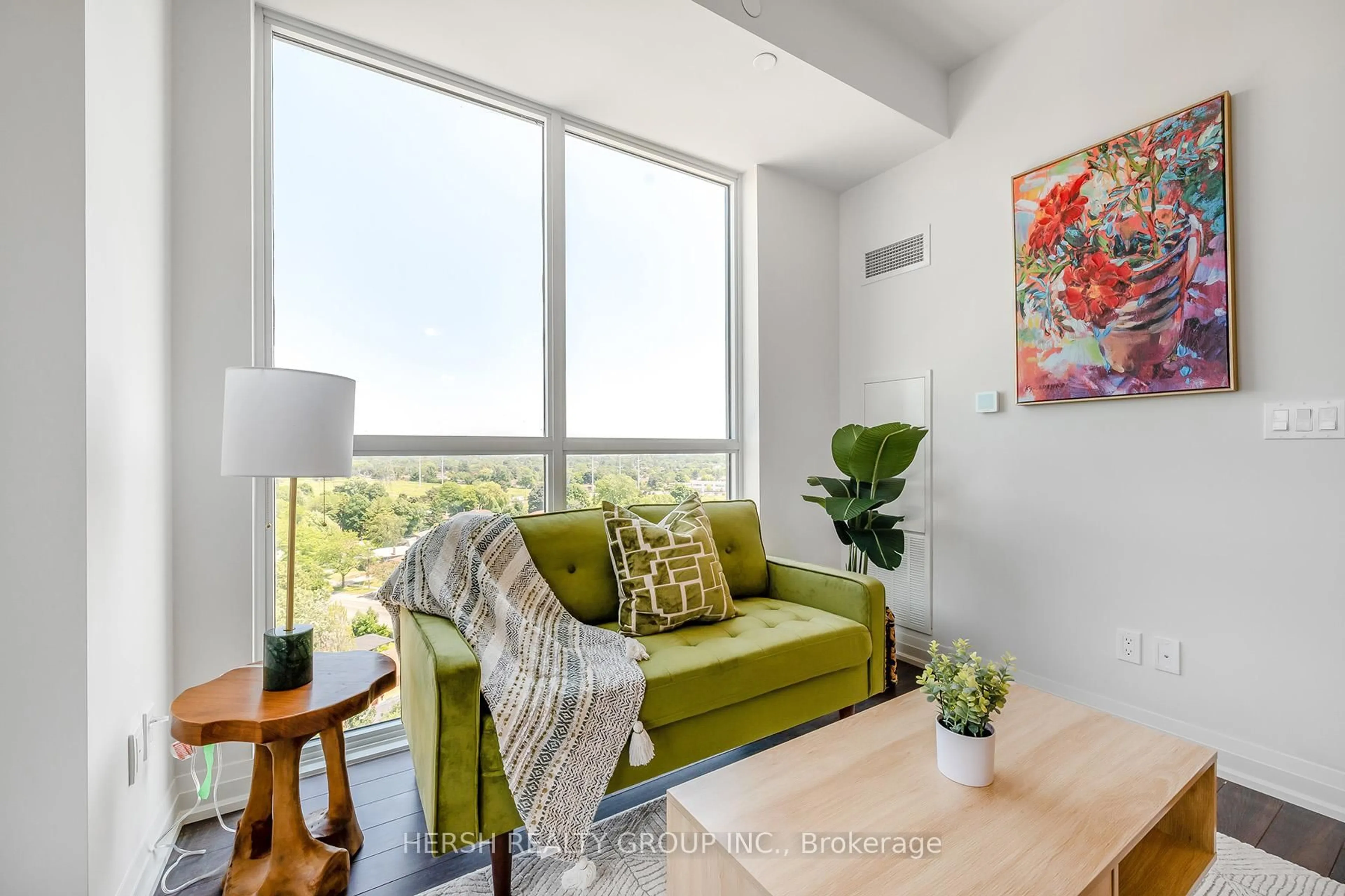 Living room with furniture, unknown for 10 Meadowglen Pl #206, Toronto Ontario M1G 0A8