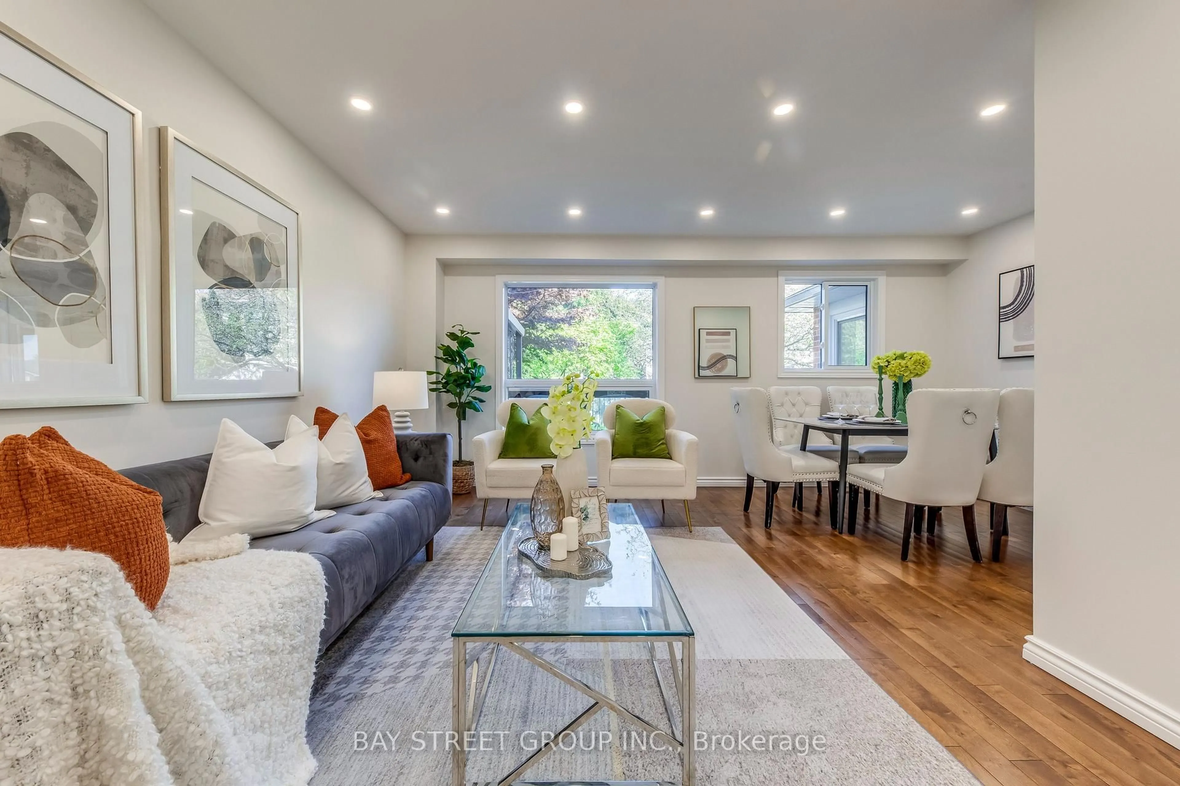 Living room with furniture, wood/laminate floor for 7 Empson Crt, Ajax Ontario L1S 3Y3