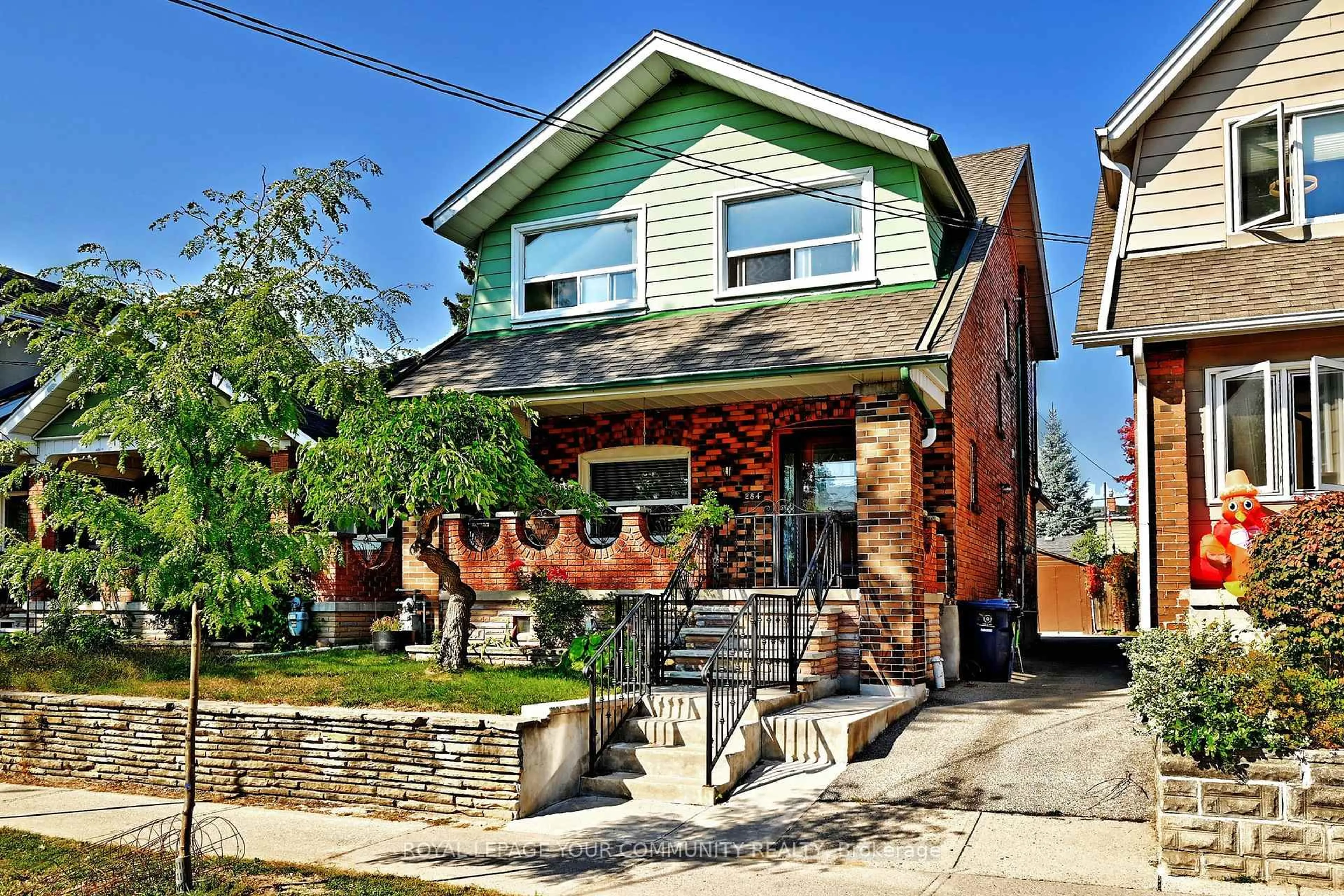 Home with brick exterior material, street for 284 Wolverleigh Blvd, Toronto Ontario M4C 1S4