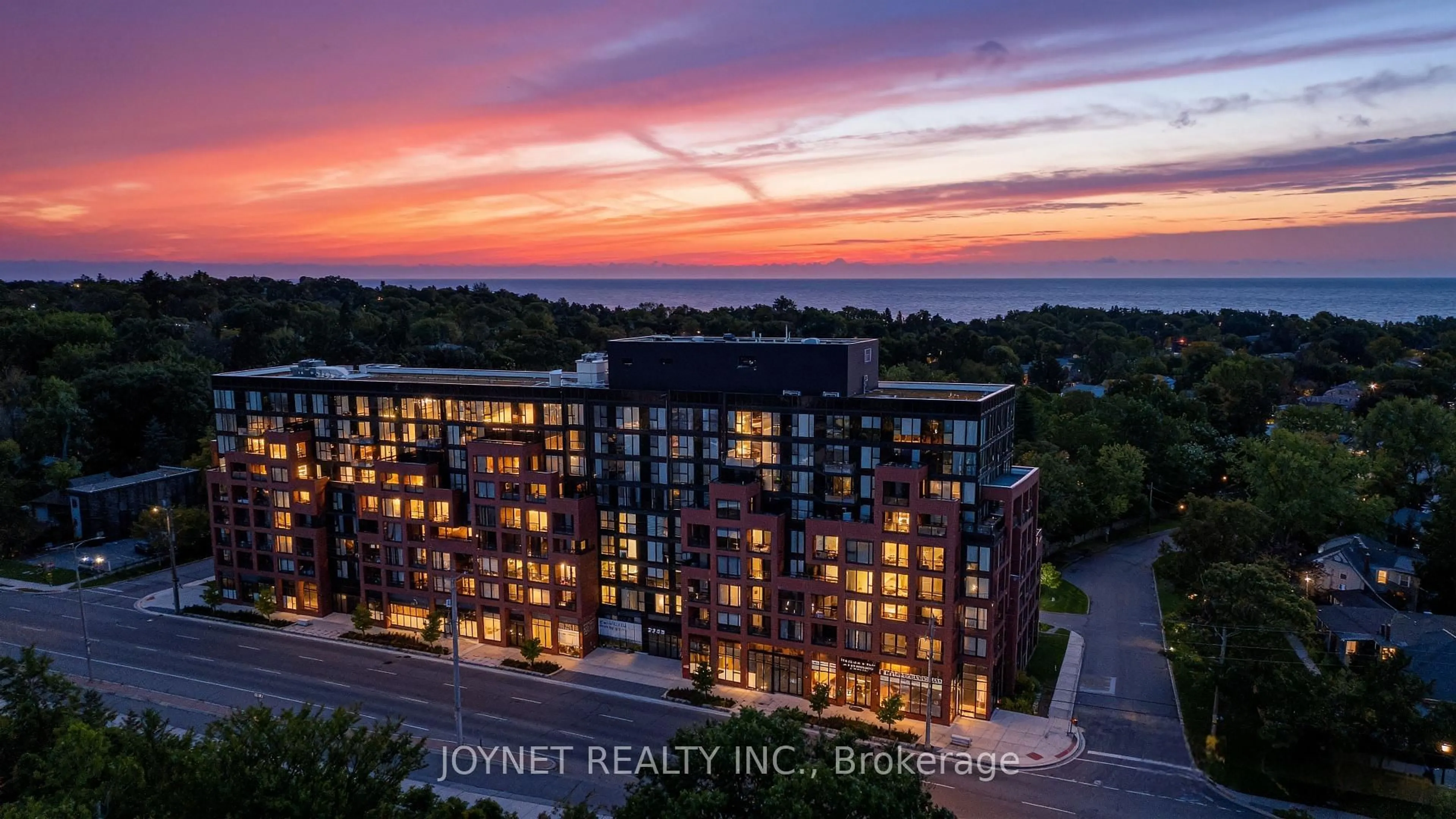 A pic from outside/outdoor area/front of a property/back of a property/a pic from drone, water/lake/river/ocean view for 2799 Kingston Rd #714, Toronto Ontario M1M 0E3
