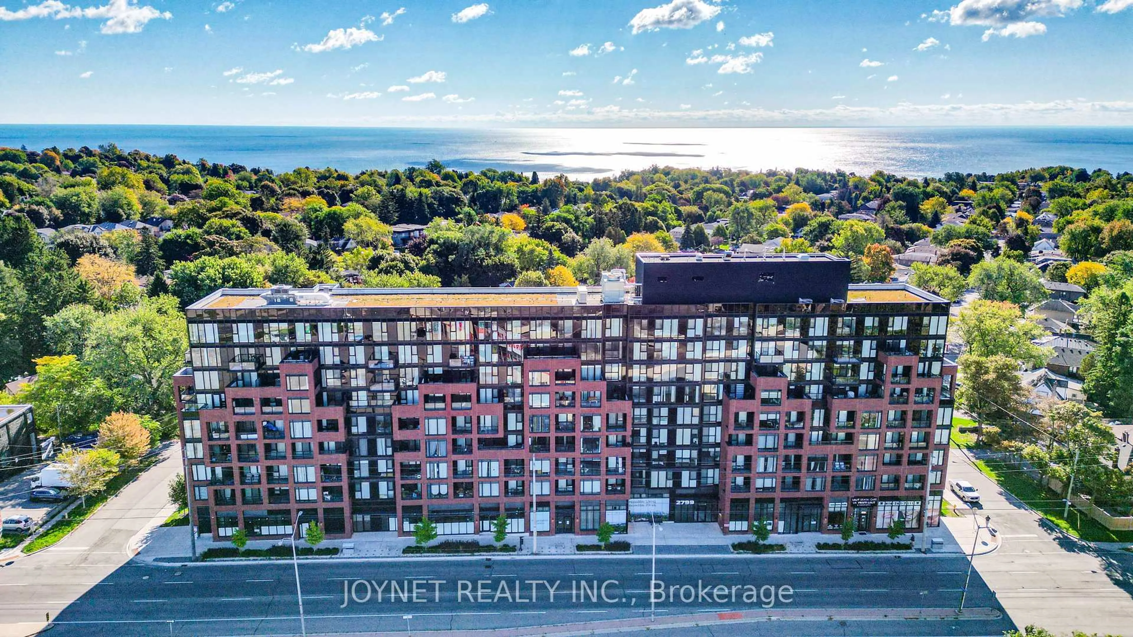 A pic from outside/outdoor area/front of a property/back of a property/a pic from drone, water/lake/river/ocean view for 2799 Kingston Rd #714, Toronto Ontario M1M 0E3