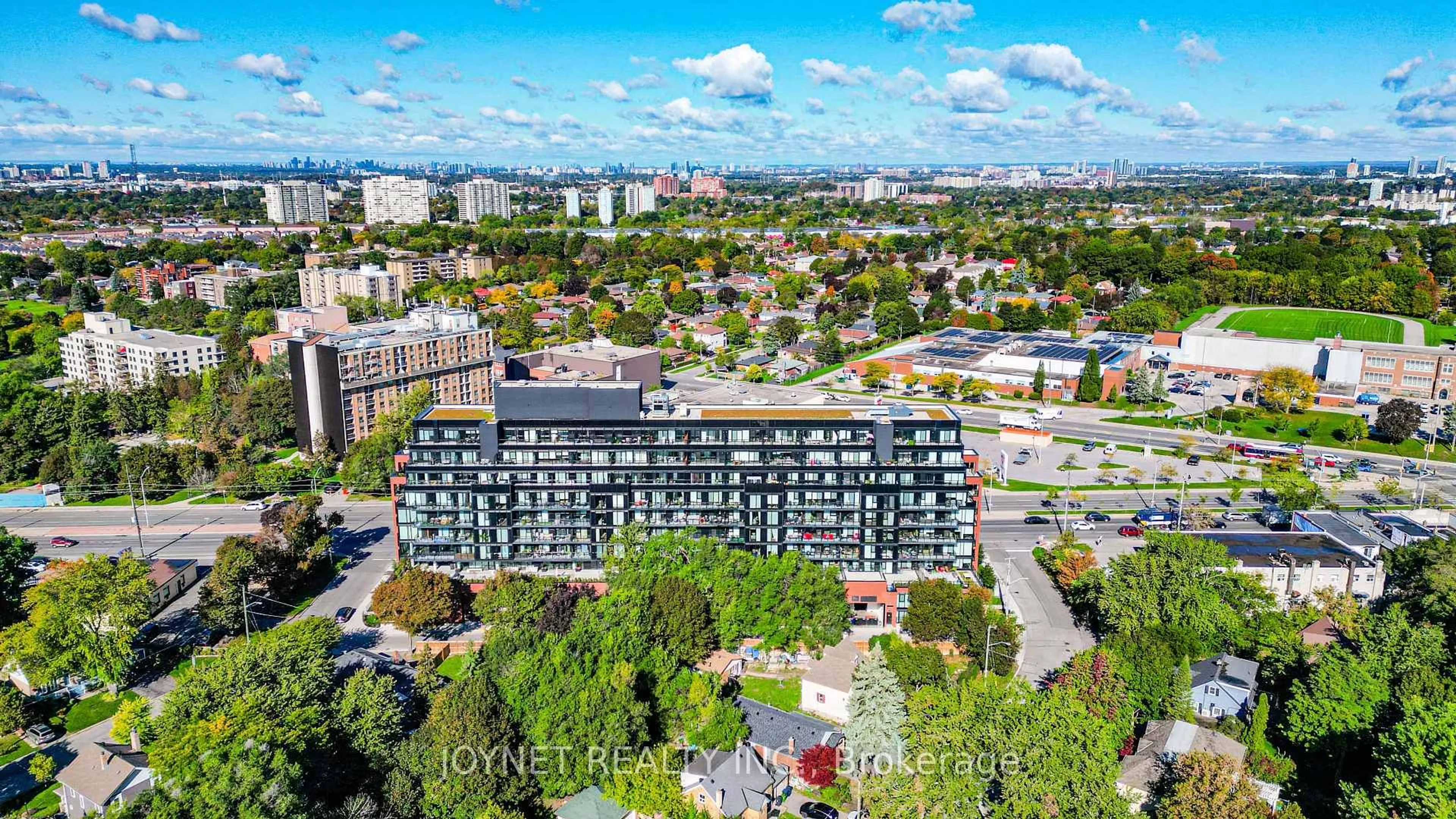 A pic from outside/outdoor area/front of a property/back of a property/a pic from drone, city buildings view from balcony for 2799 Kingston Rd #714, Toronto Ontario M1M 0E3