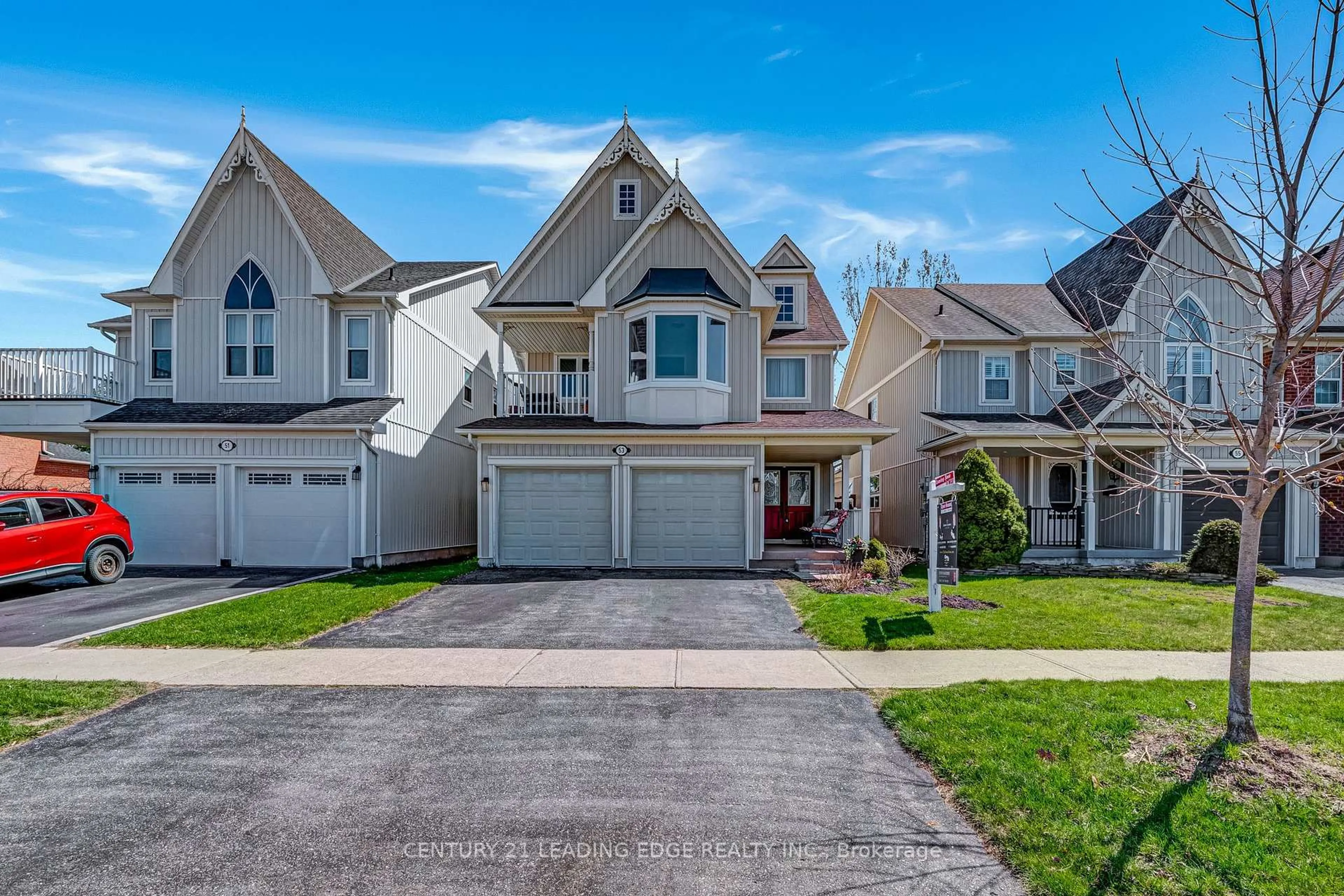 Home with vinyl exterior material, street for 53 Kinross Ave, Whitby Ontario L1M 2C4