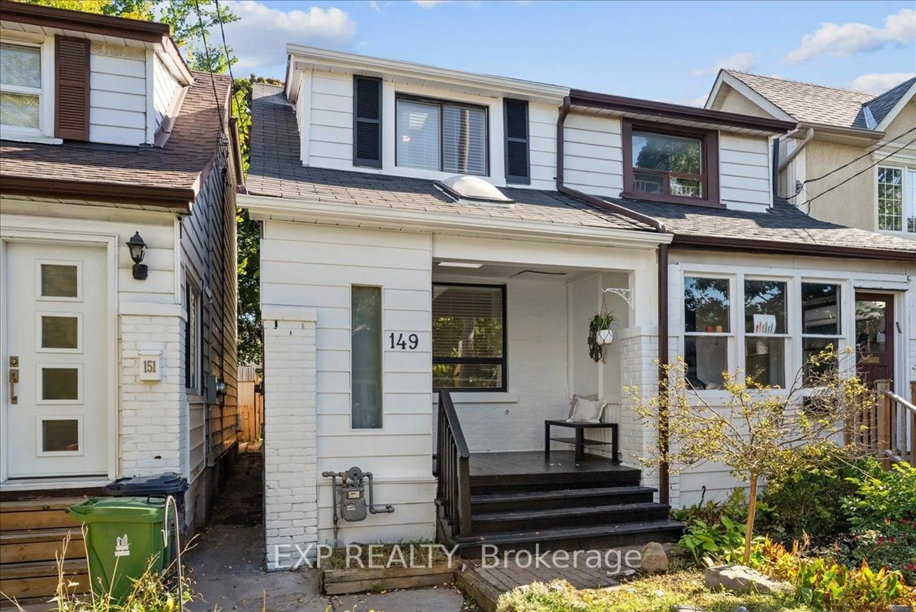 Home with brick exterior material, street for 149 Drayton Ave, Toronto Ontario M4C 3M1