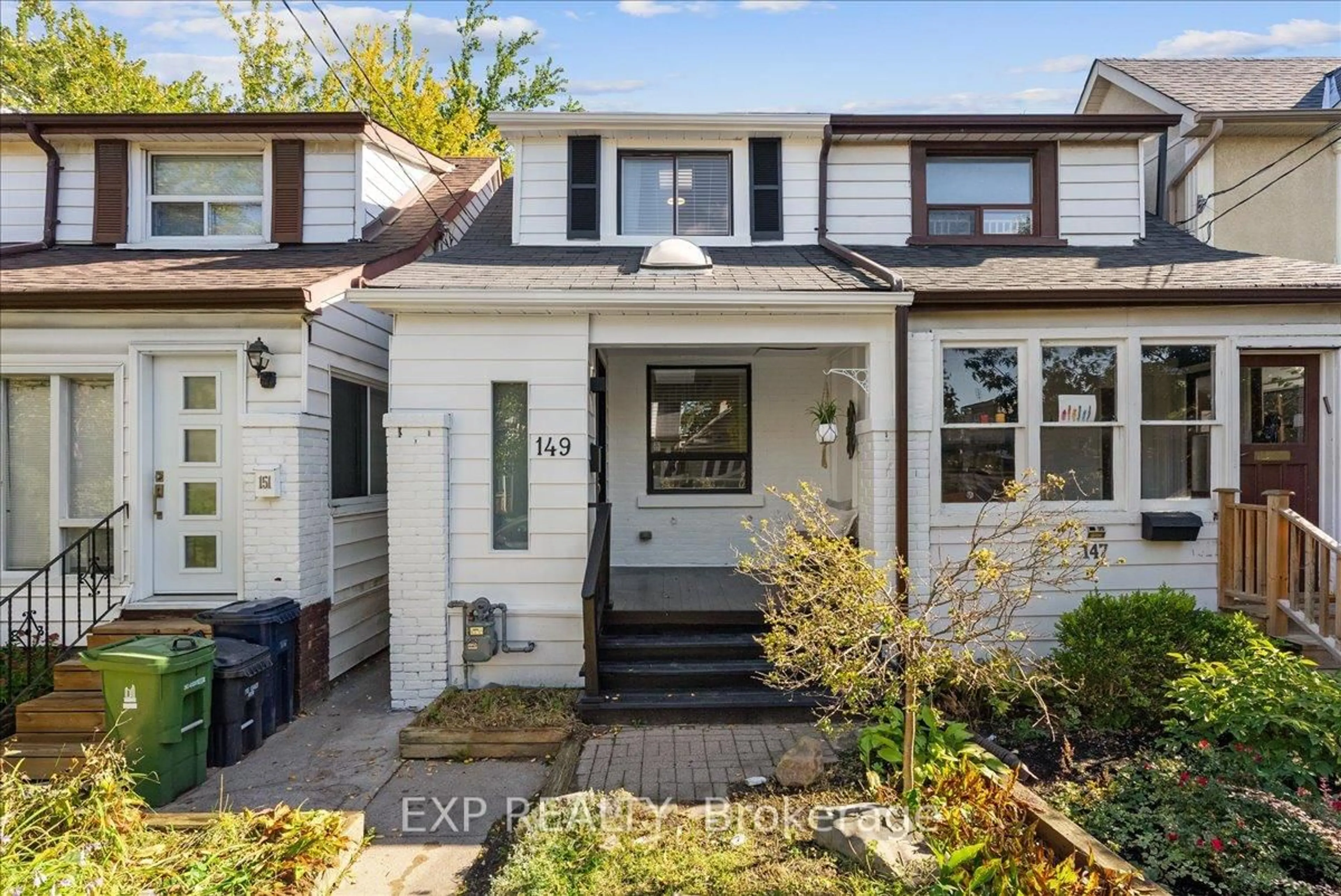Home with vinyl exterior material, street for 149 Drayton Ave, Toronto Ontario M4C 3M1