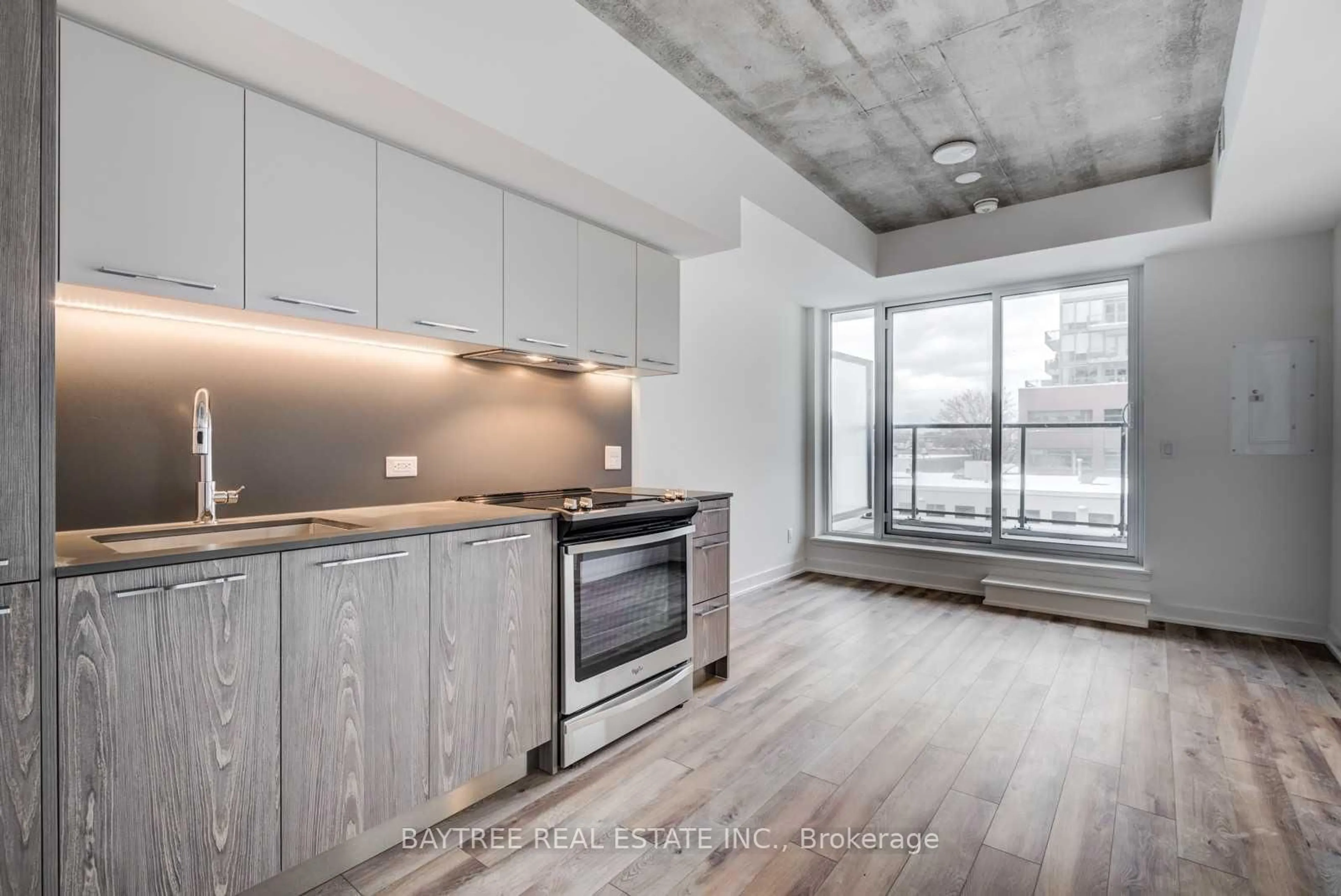 Open concept kitchen, unknown for 30 Baseball Pl #404, Toronto Ontario M4M 0E8