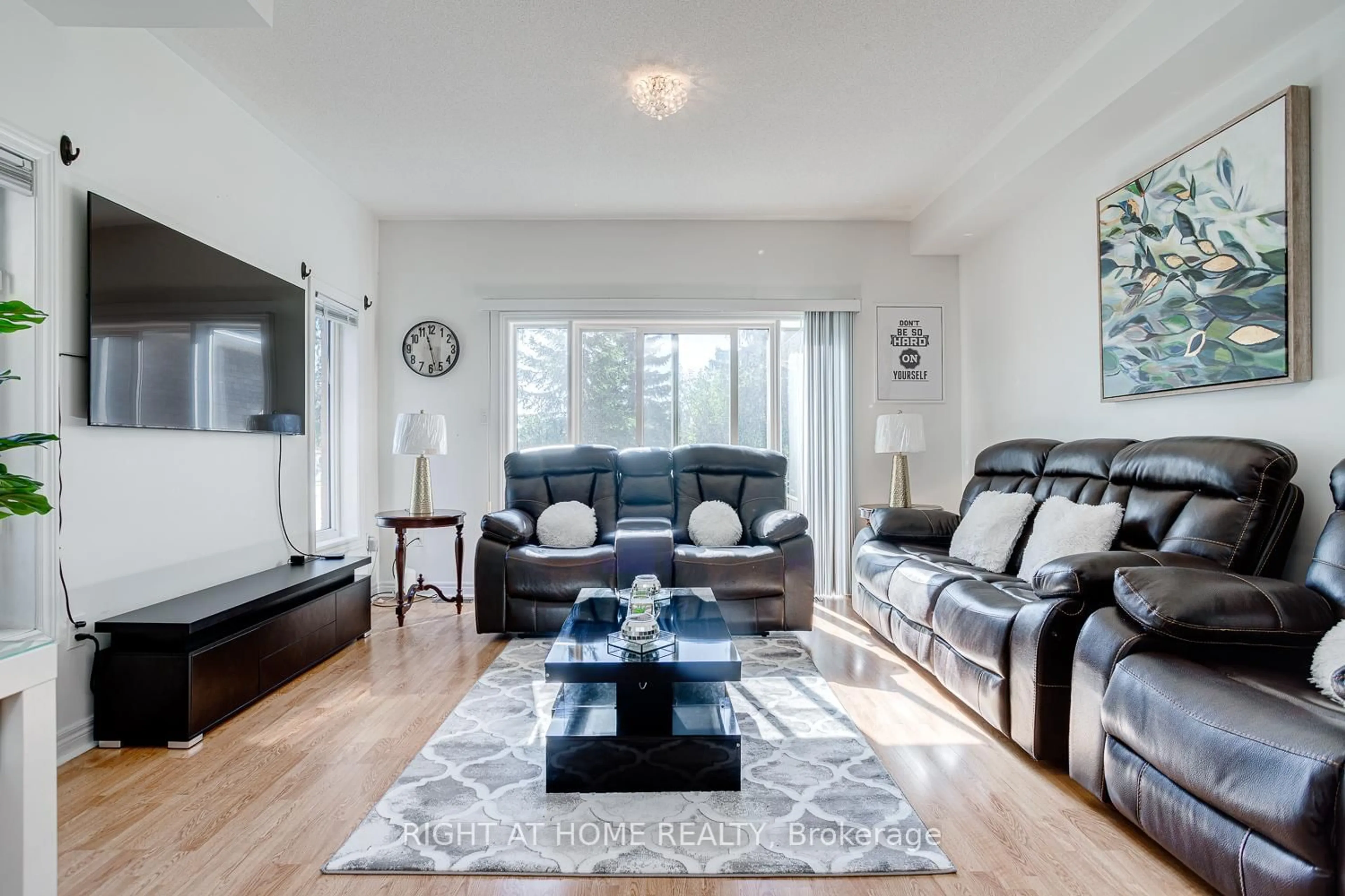 Living room with furniture, wood/laminate floor for 19 Niagara Dr #17, Oshawa Ontario L1G 8G2