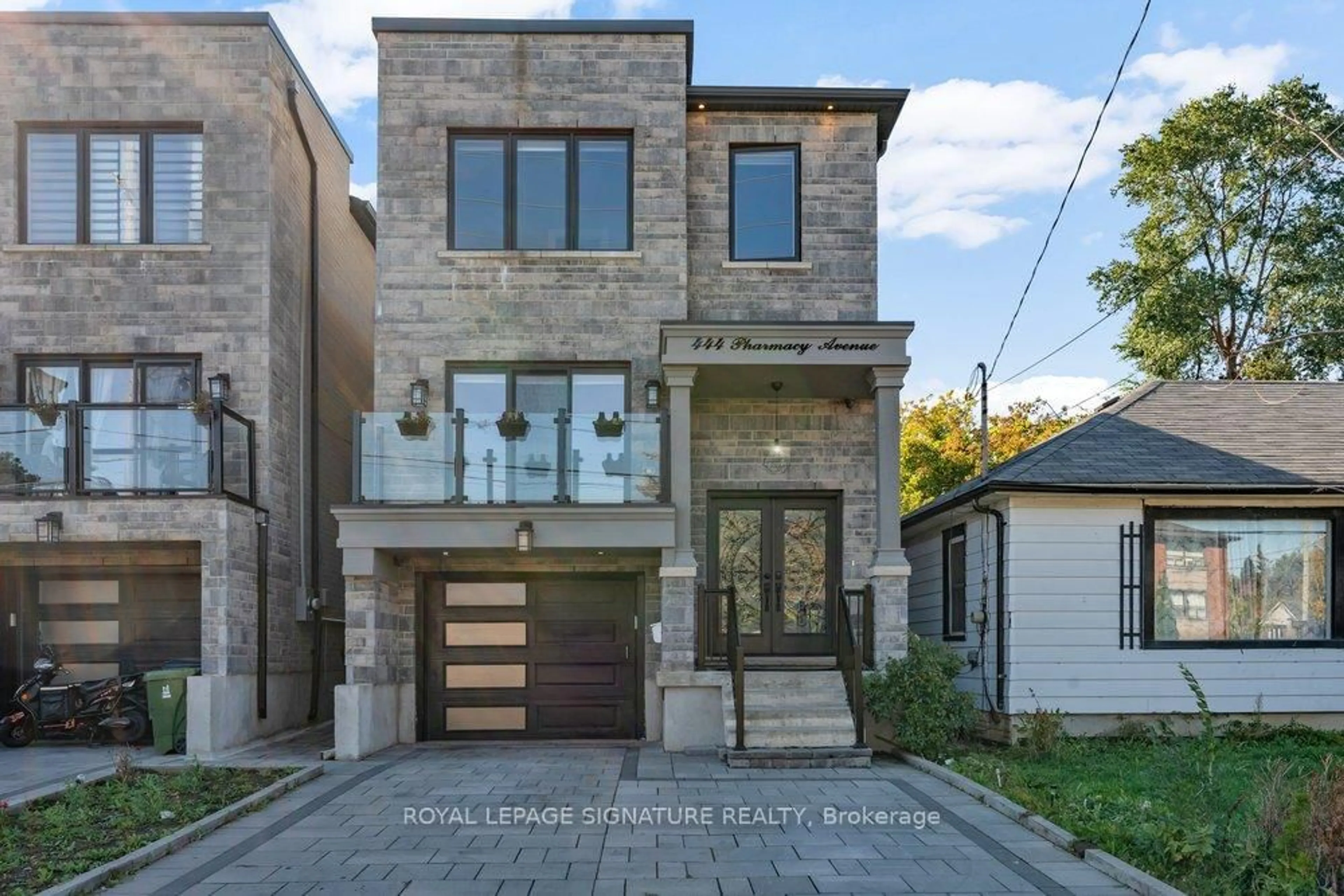Home with brick exterior material, street for 444 Pharmacy Ave, Toronto Ontario M1L 3G6