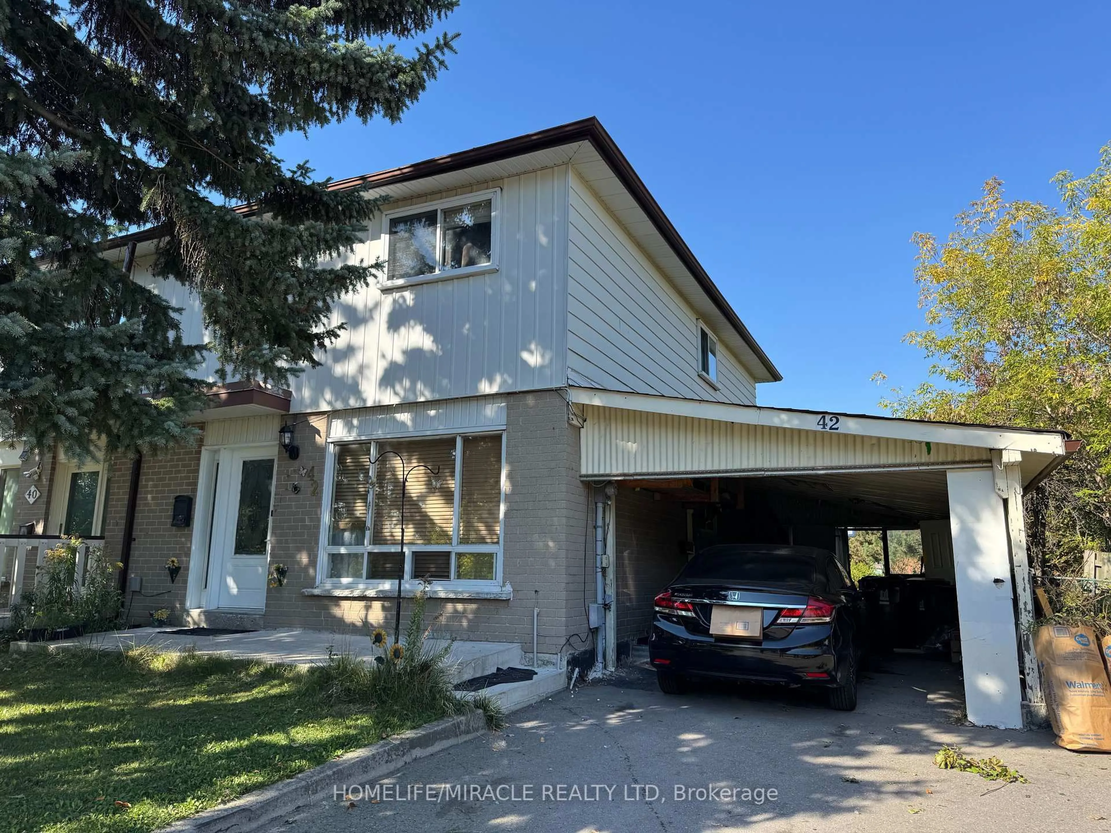 Home with vinyl exterior material, street for 42 Nahanni Terr, Toronto Ontario M1B 1B8