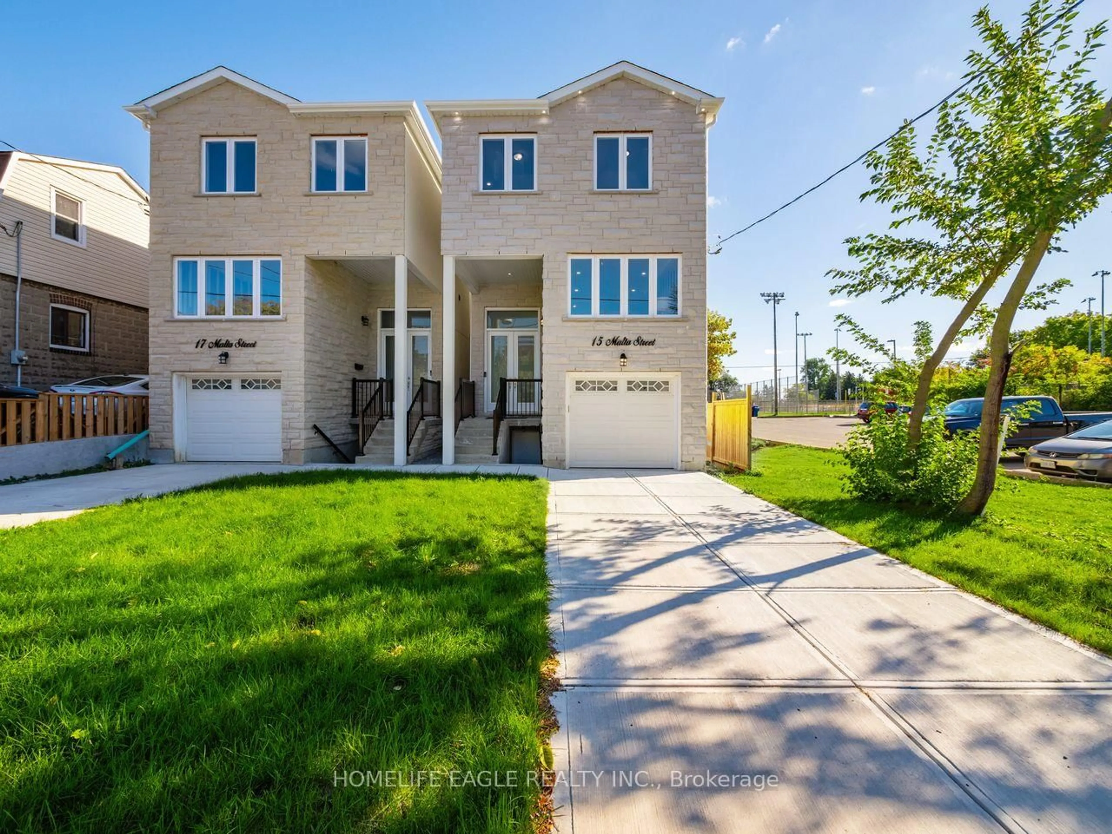 Home with vinyl exterior material, street for 15 Malta St, Toronto Ontario M1N 2L2