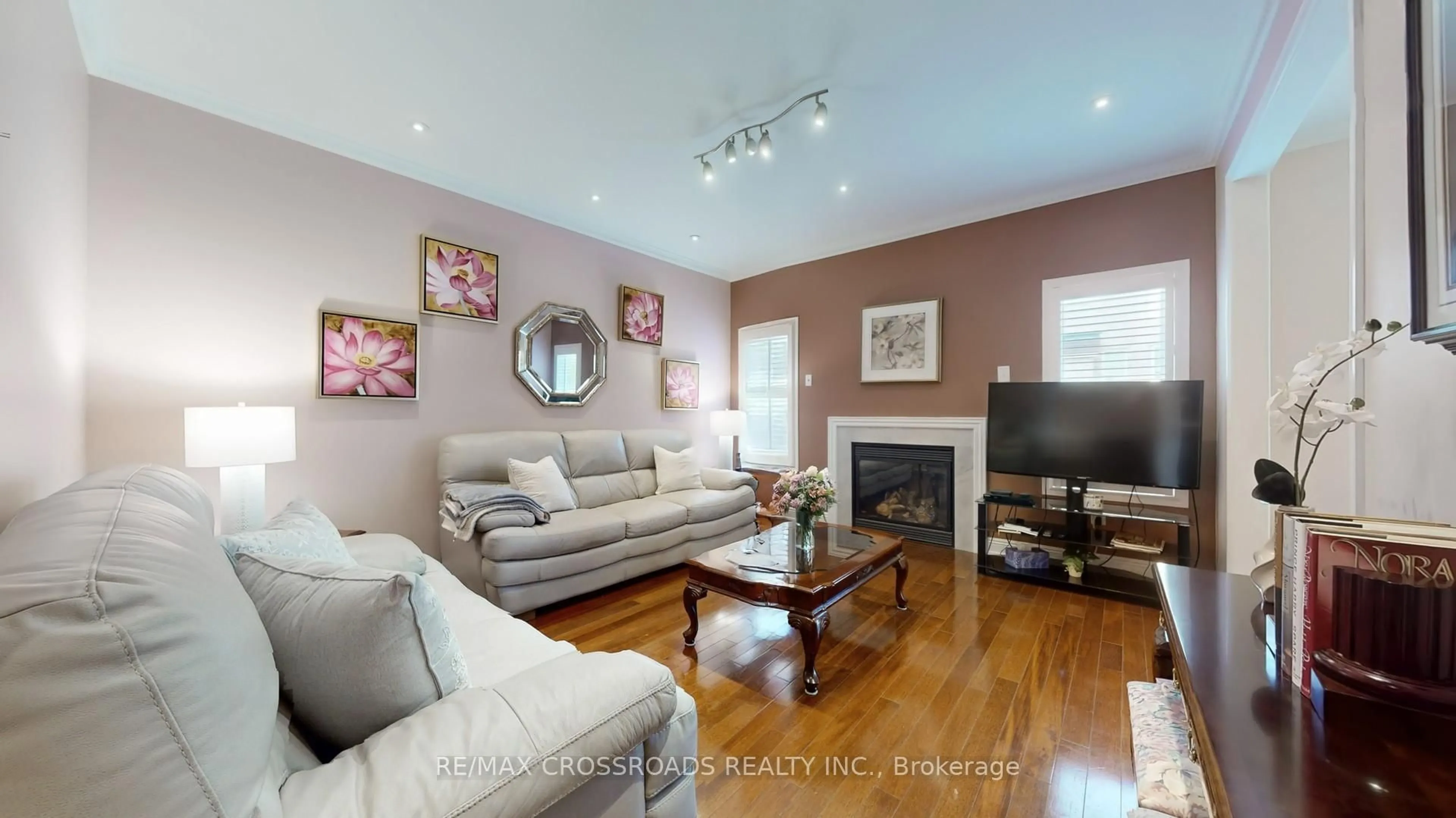 Living room with furniture, wood/laminate floor for 14 Coyle St, Ajax Ontario L1T 0A2