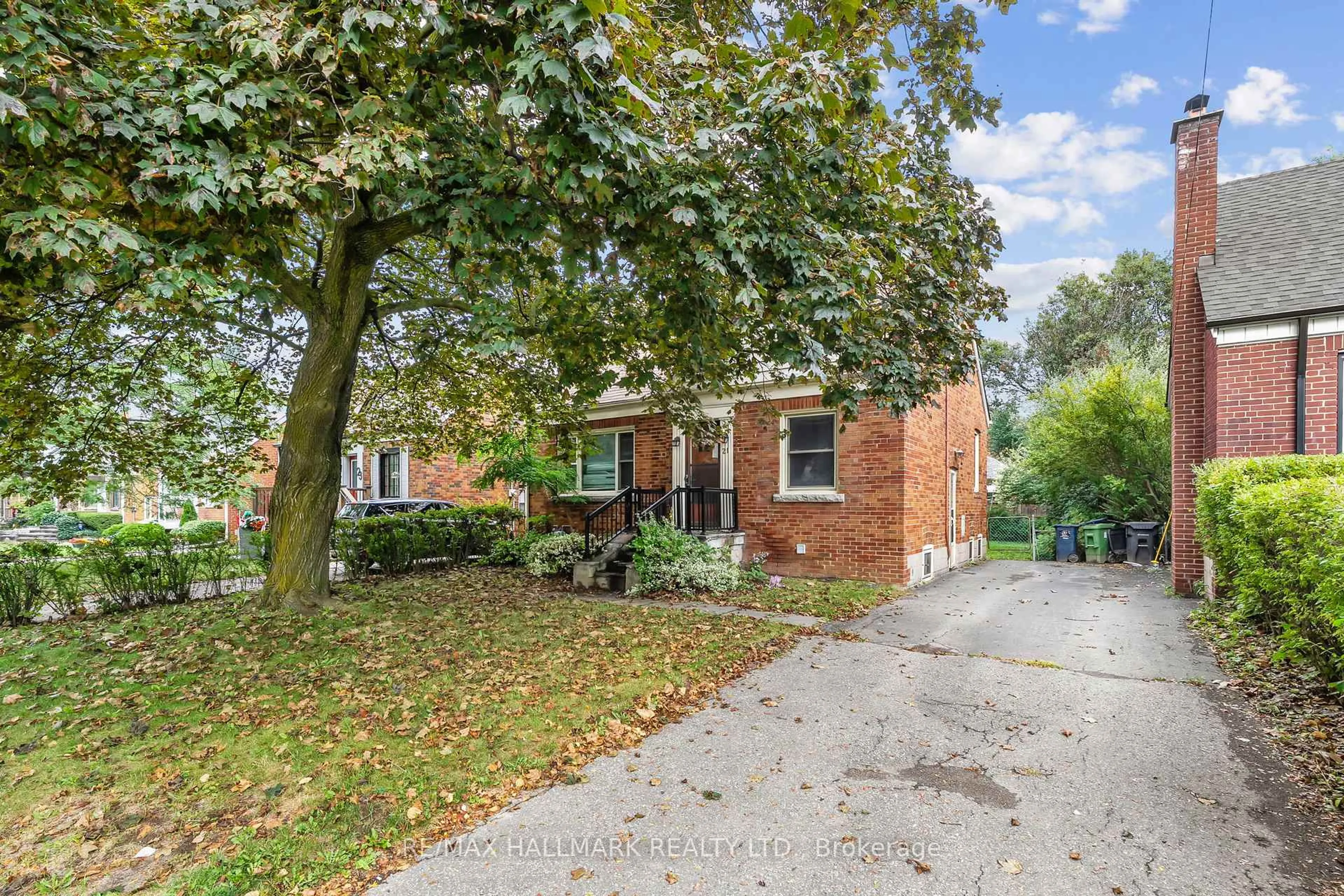 Home with brick exterior material, street for 21 Plaxton Dr, Toronto Ontario M4B 2P6