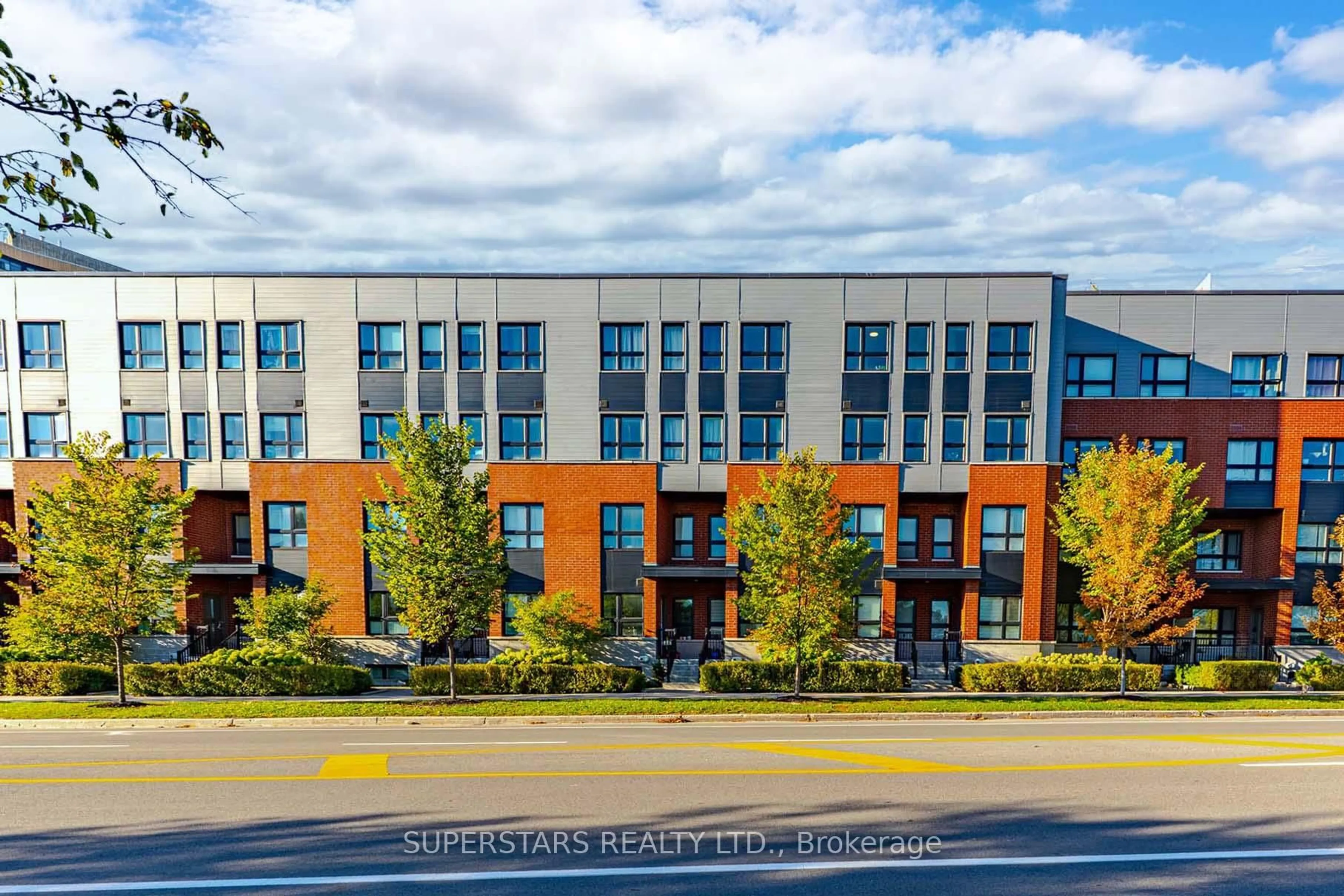 A pic from outside/outdoor area/front of a property/back of a property/a pic from drone, street for 2100 Bridletowne Circ #305, Toronto Ontario M1W 0A6