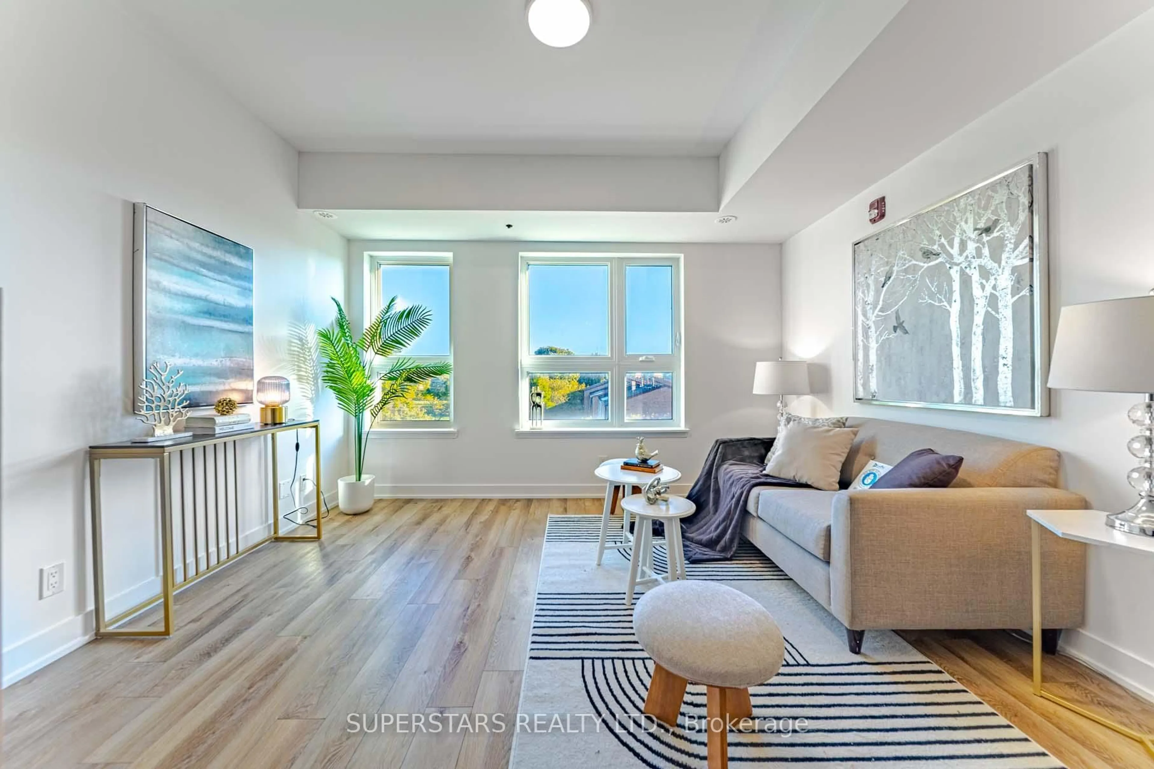 Living room with furniture, unknown for 2100 Bridletowne Circ #305, Toronto Ontario M1W 0A6