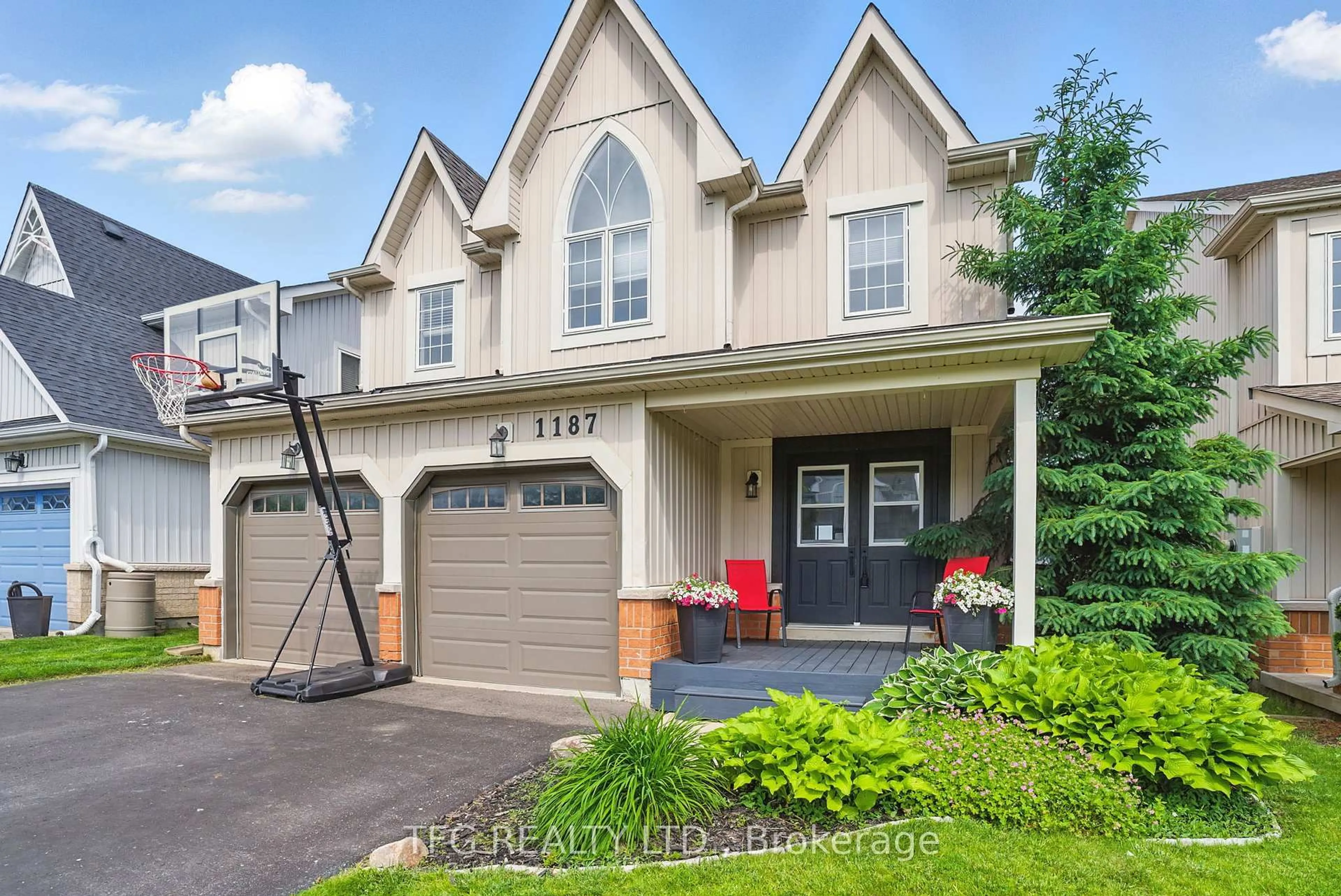 Home with brick exterior material, street for 1187 Ashgrove Cres, Oshawa Ontario L1K 3A4