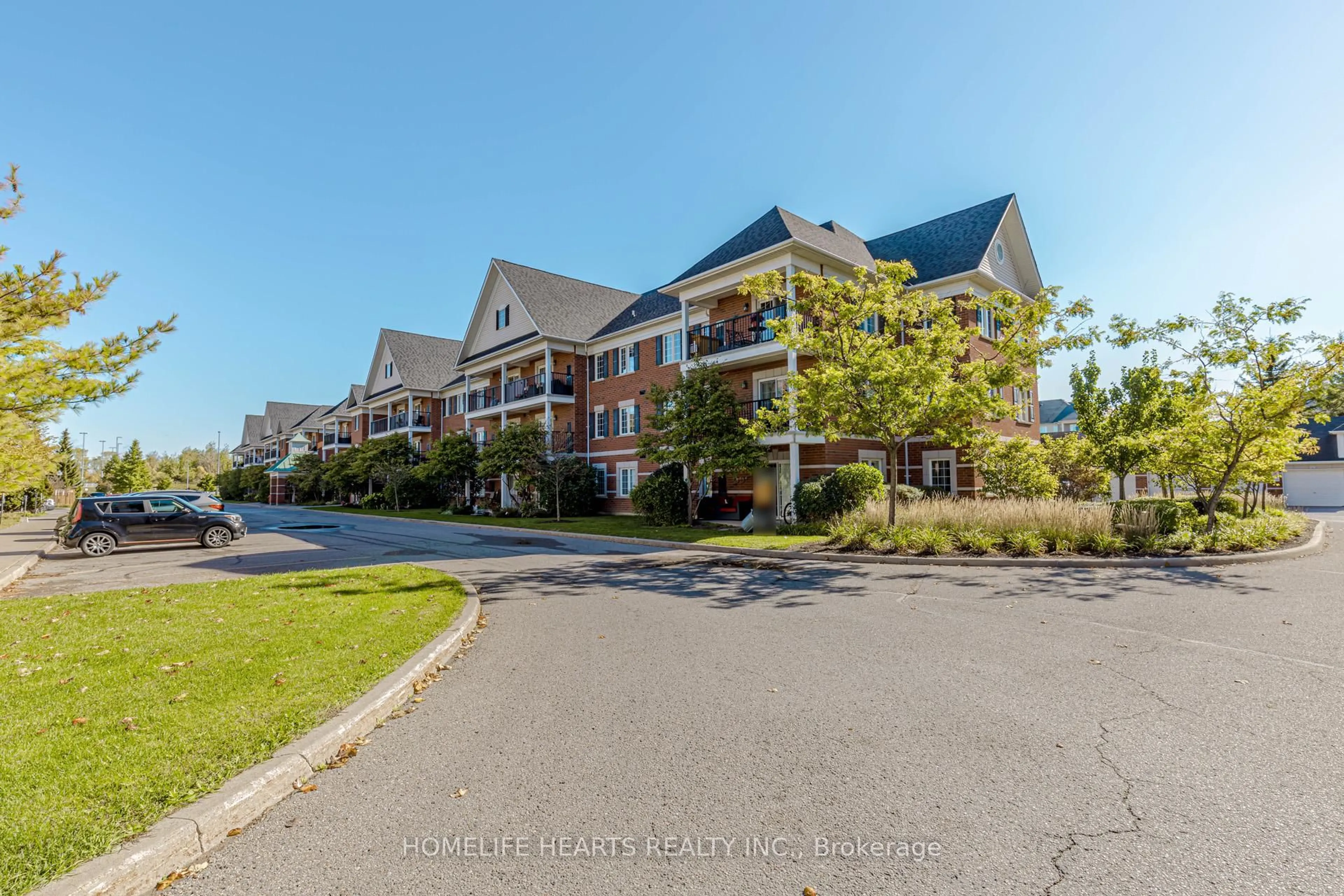 A pic from outside/outdoor area/front of a property/back of a property/a pic from drone, water/lake/river/ocean view for 61 Clarington Blvd #315, Clarington Ontario L1C 0A1