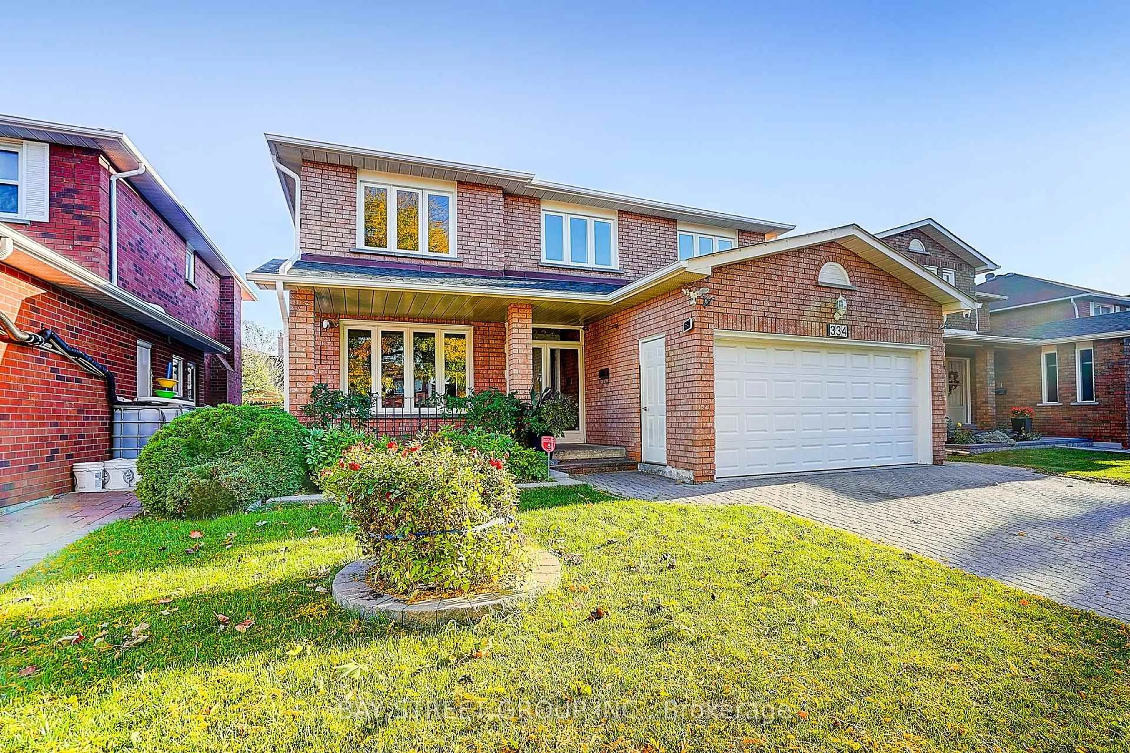 Home with brick exterior material, street for 334 Goldhawk Tr, Toronto Ontario M1V 4G2