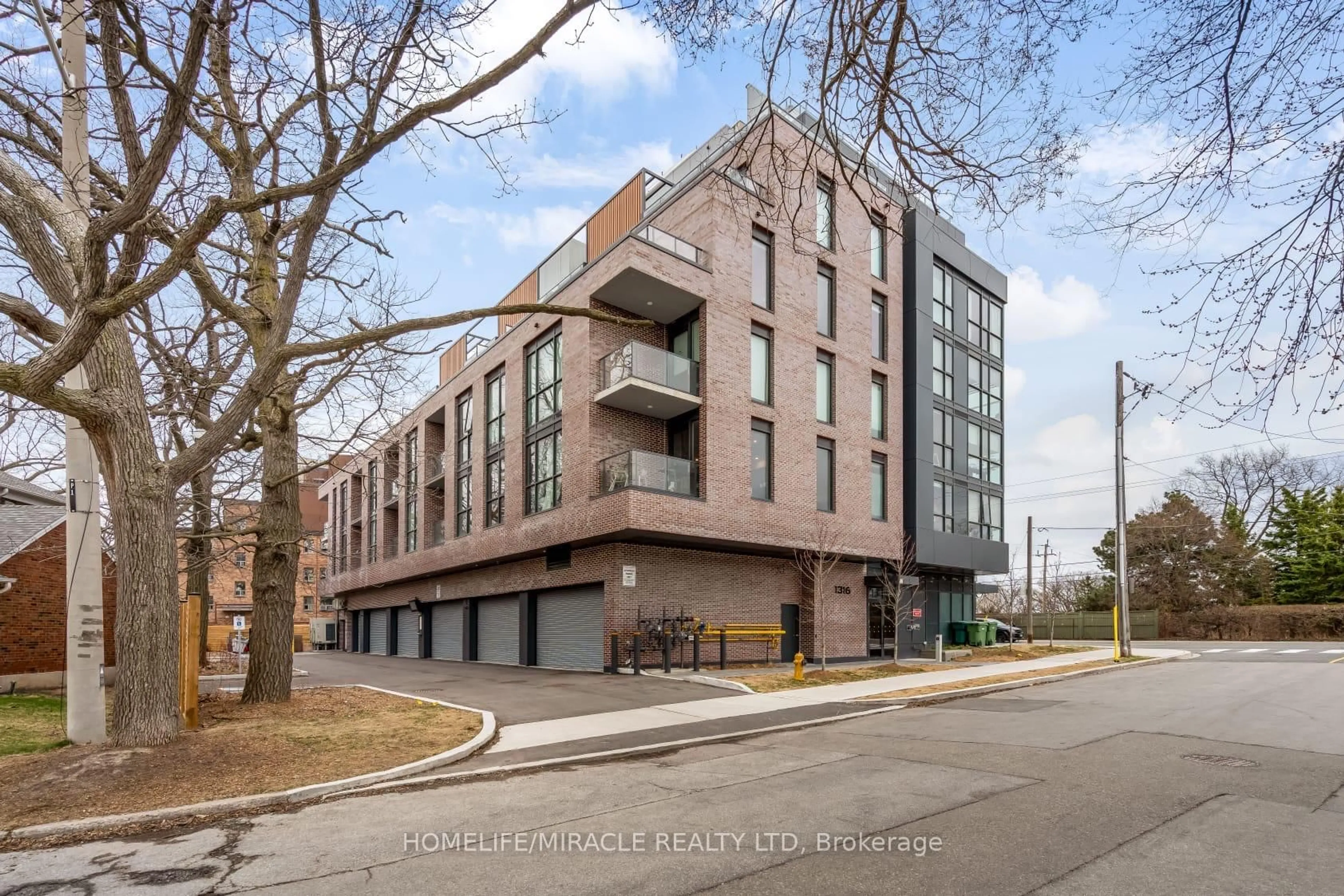 Home with brick exterior material, building for 1316 Kingston Rd #201, Toronto Ontario M1N 1P6