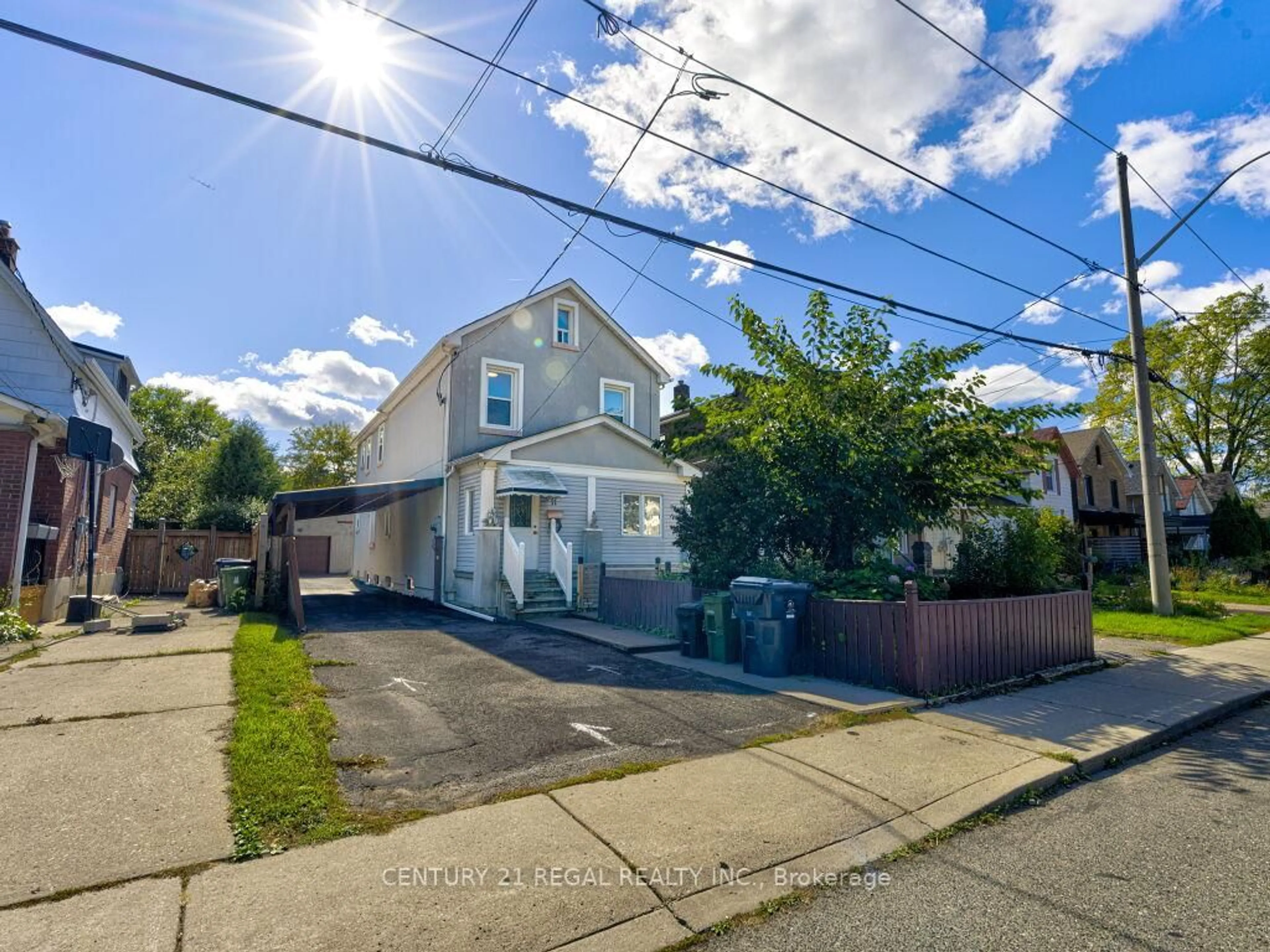 A pic from outside/outdoor area/front of a property/back of a property/a pic from drone, street for 11 Midburn Ave, Toronto Ontario M4C 2C8