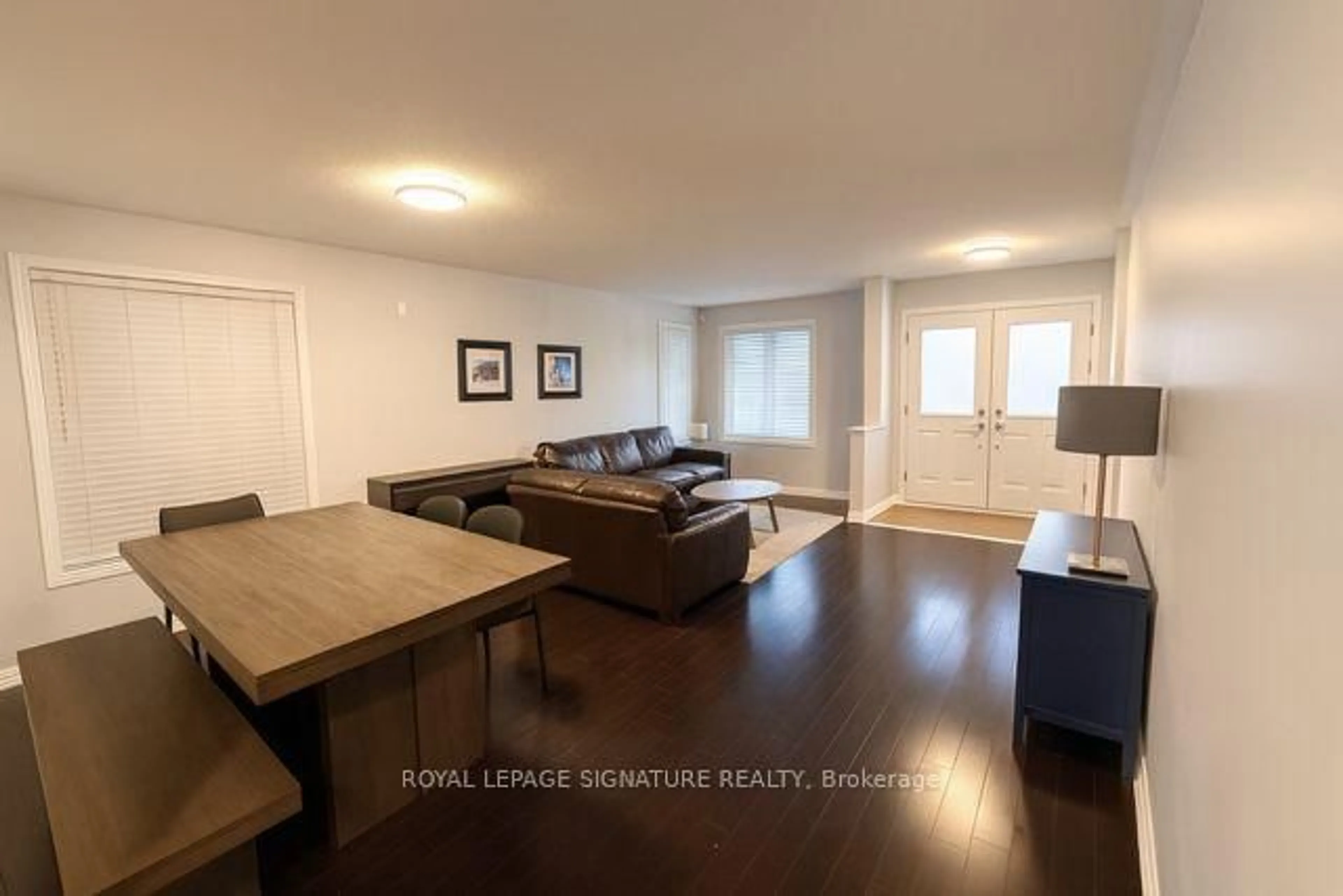 Living room with furniture, wood/laminate floor for 17 Salvage St, Ajax Ontario L1Z 1S5