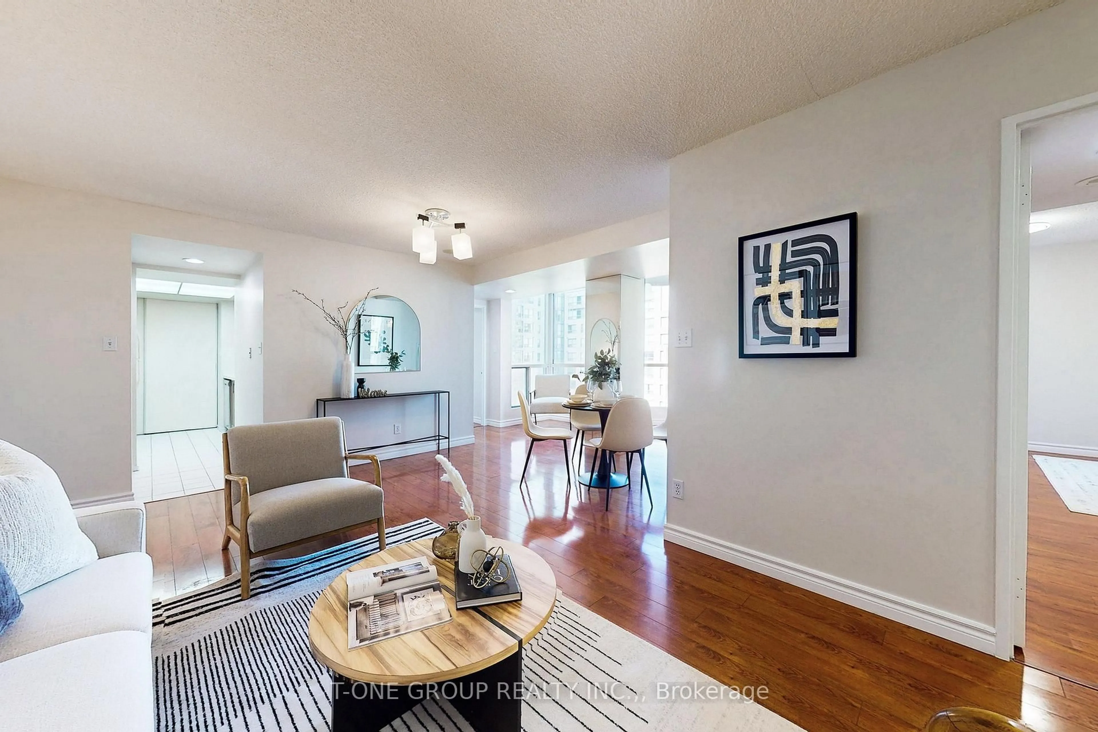 Living room with furniture, wood/laminate floor for 2550 Lawrence Ave #808, Toronto Ontario M1P 2E7
