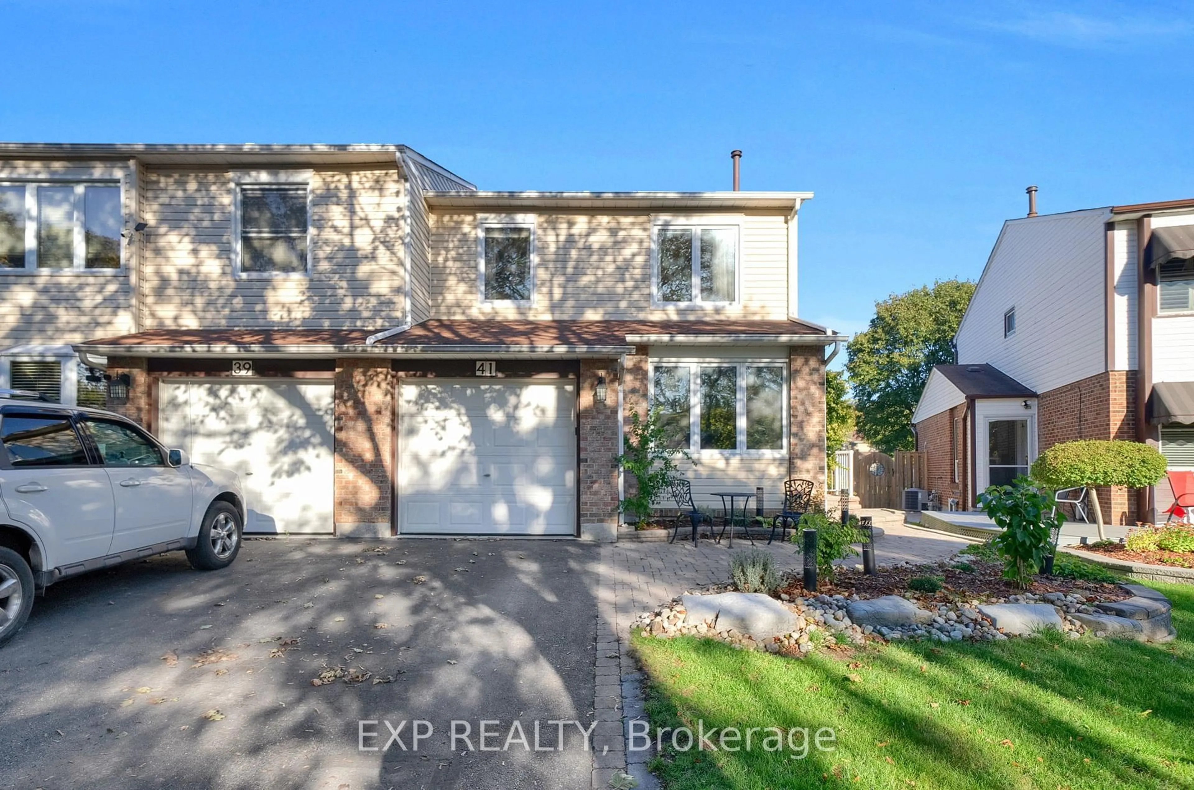 Home with brick exterior material, street for 41 Teresa Dr, Whitby Ontario L1N 6H9
