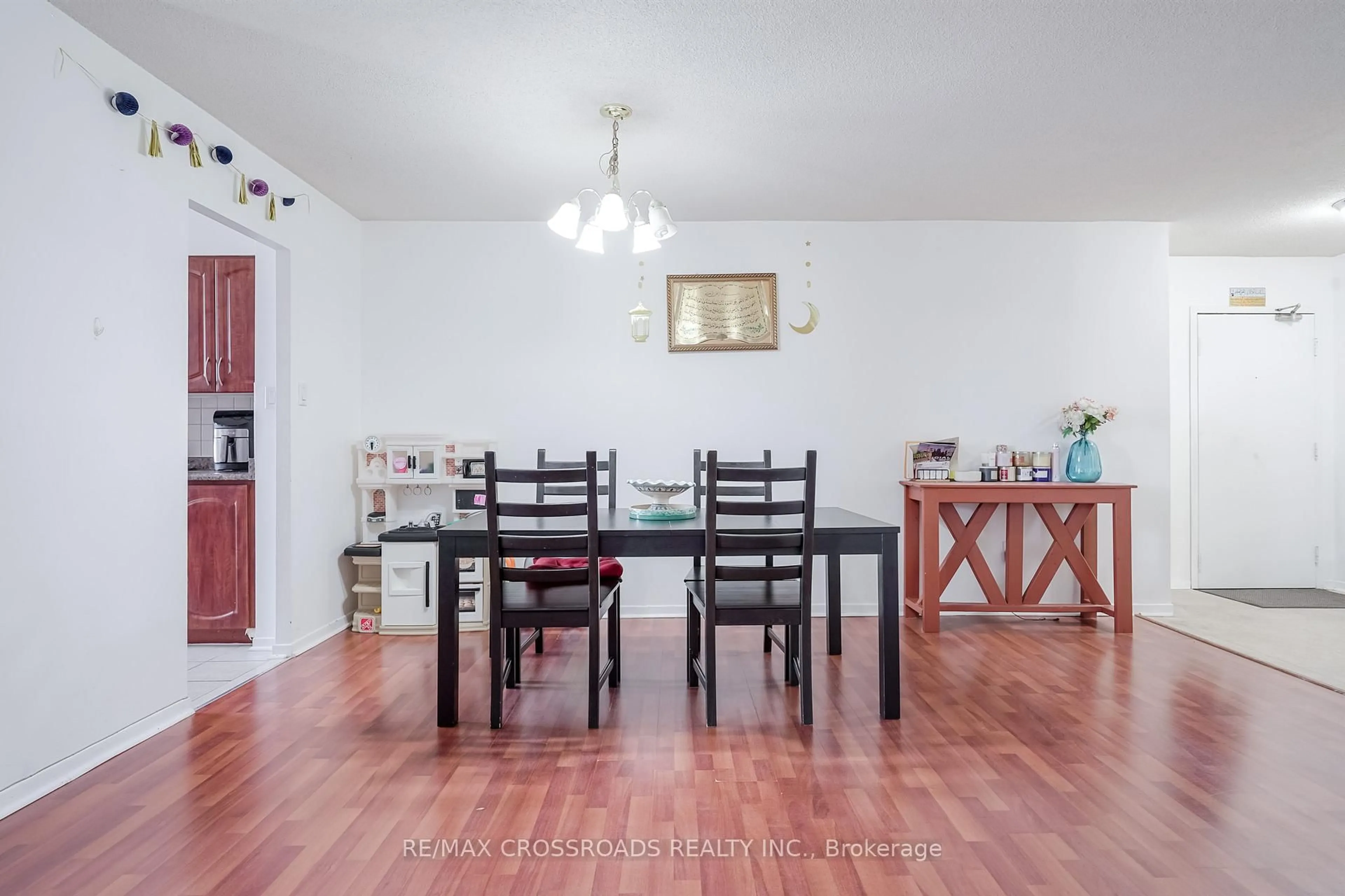 Dining room, wood/laminate floor for 15 Sewells Rd #1204, Toronto Ontario M1B 3V7