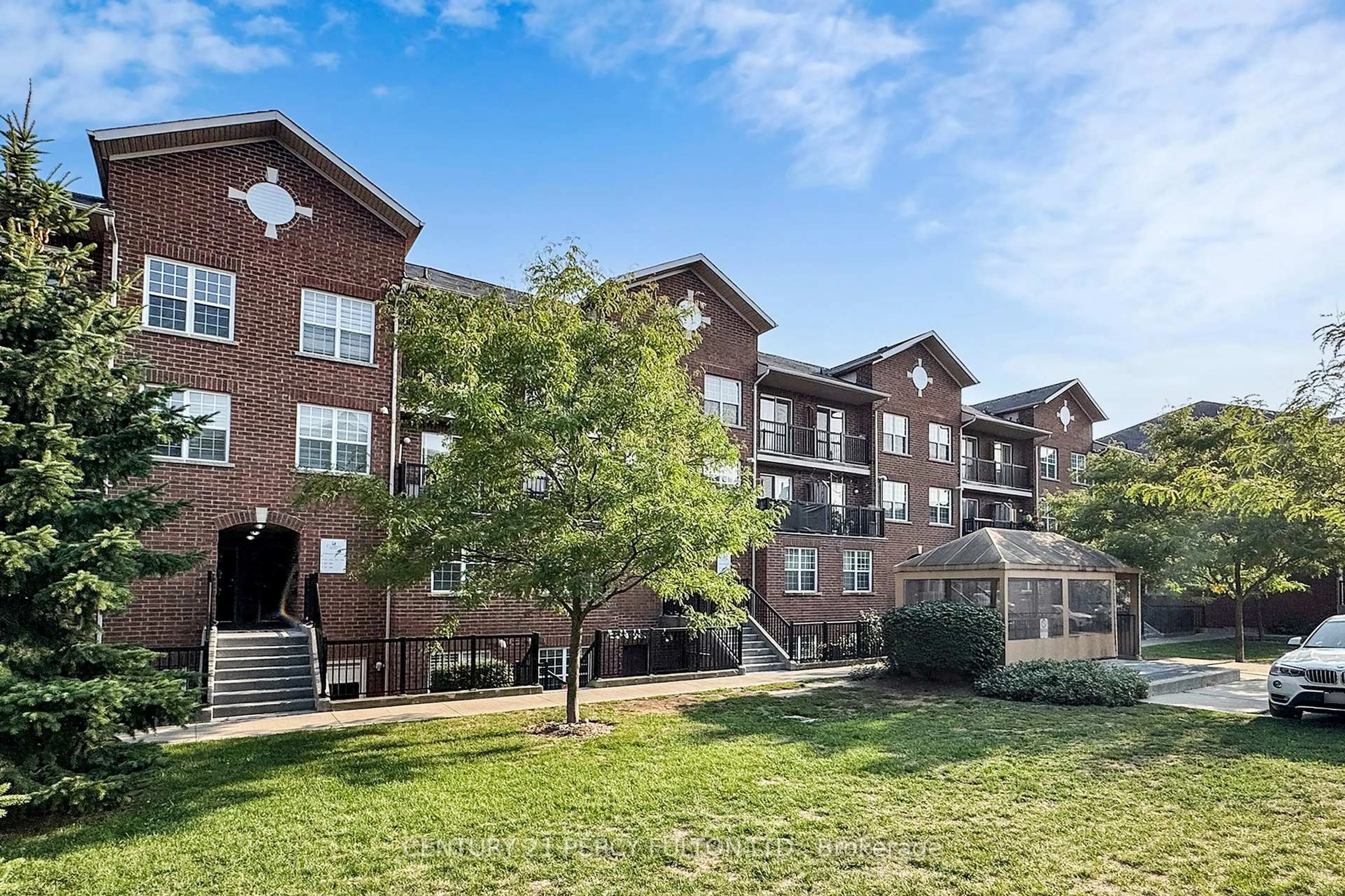 A pic from outside/outdoor area/front of a property/back of a property/a pic from drone, unknown for 45 Strangford Lane #308F, Toronto Ontario M1L 0E5