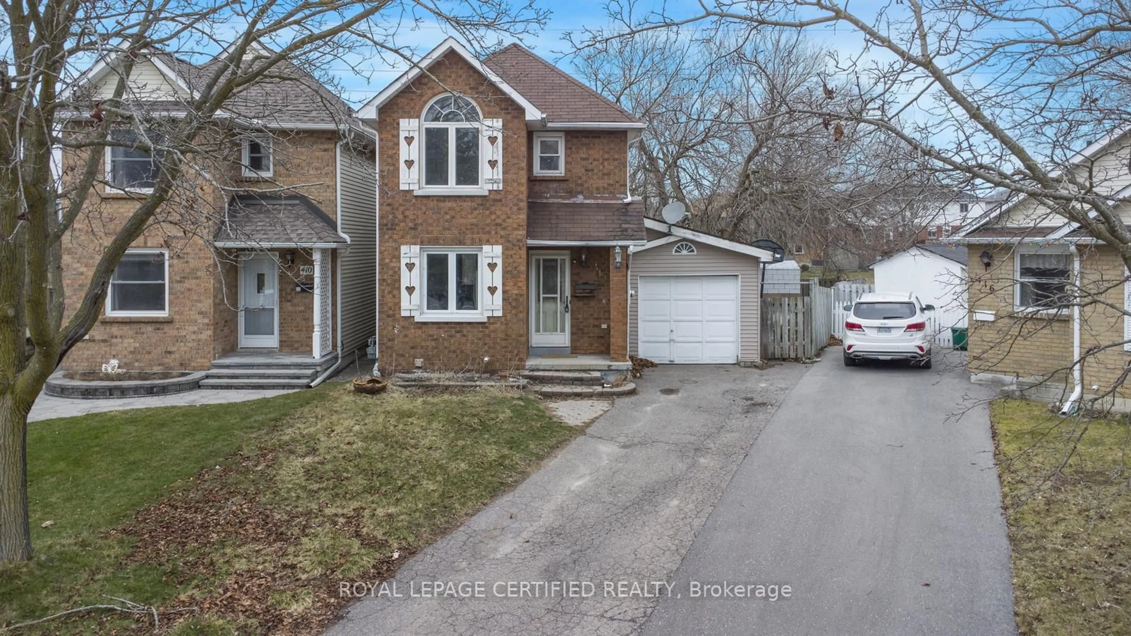 Home with brick exterior material, street for 412 Pompano Crt, Oshawa Ontario L1K 1M9